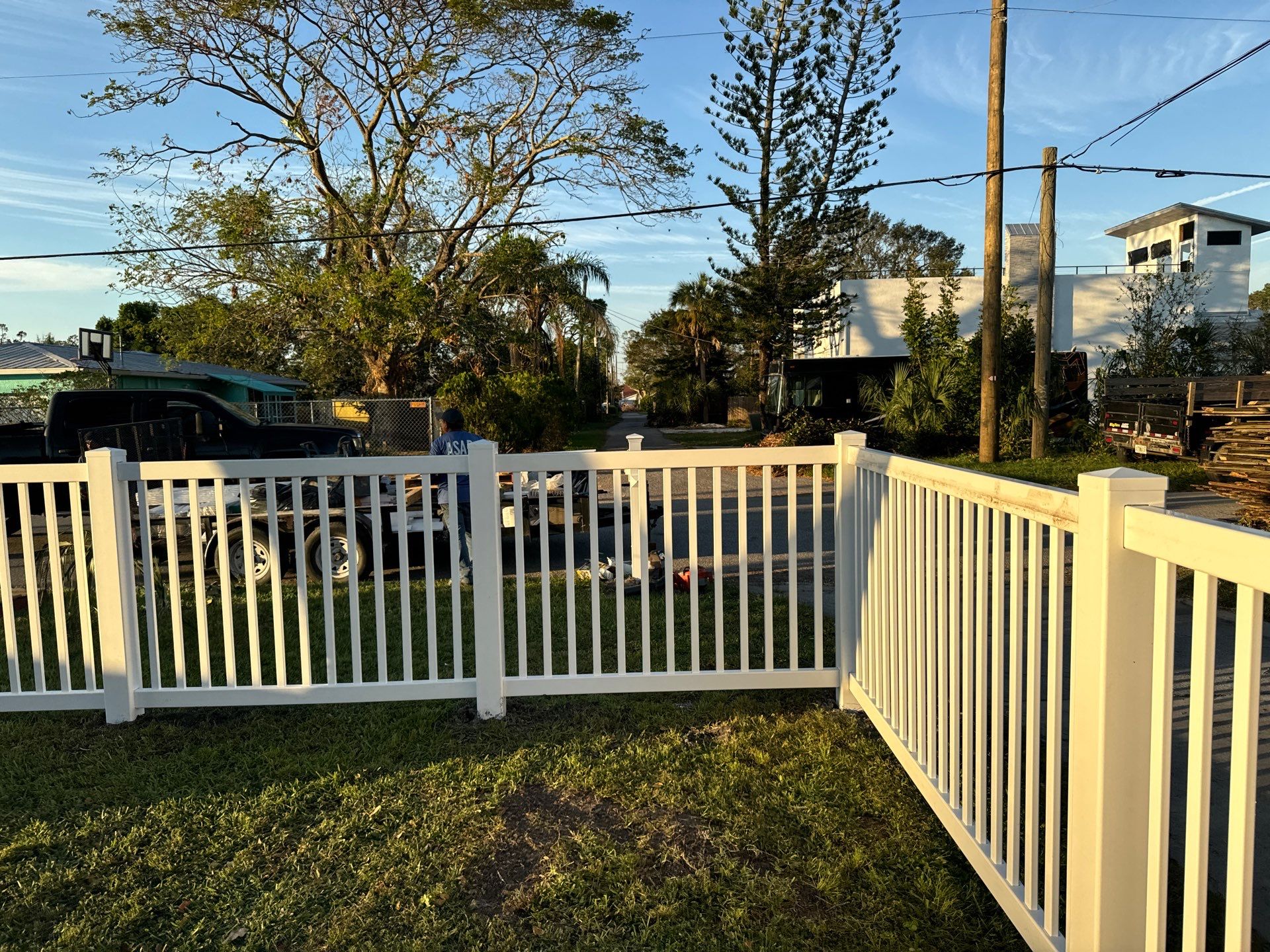 Vinyl Fence Installation using 6Ft White Vinyl Privacy Fence and a 4Ft White Vinyl Picket Fence by Asap fence and gates, LLC