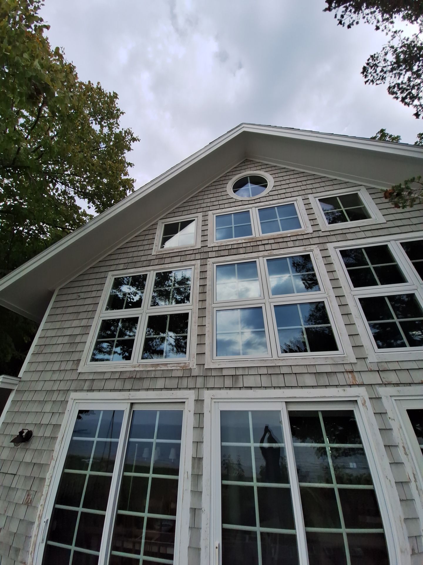 Lakefront Deck Pressure Washing, Exterior Wood Staining, and Painting in West Olive MI by Gordon Painting