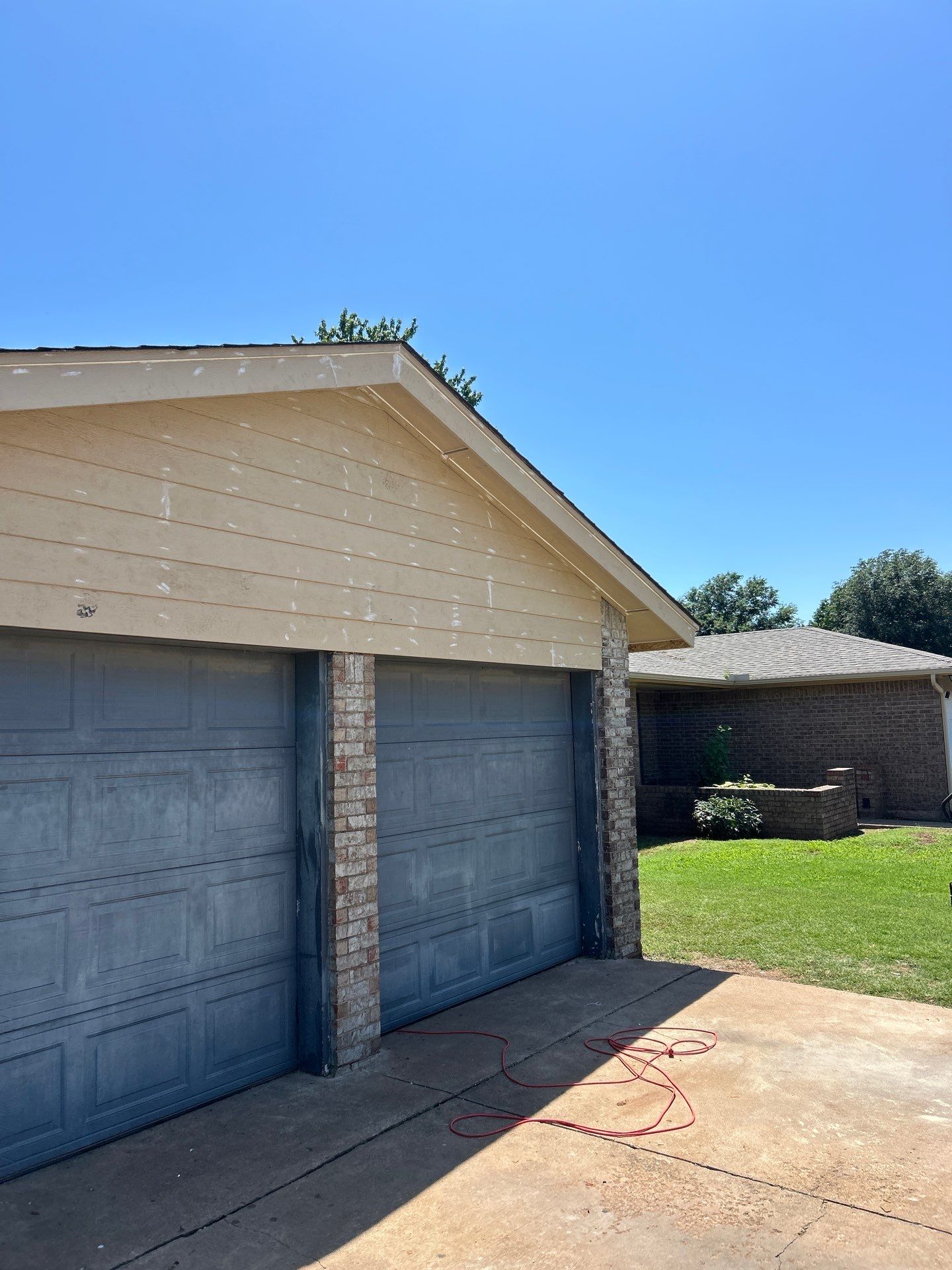 siding replacement & soffit replacement in Edmond by McCann's Roofing and Construction
