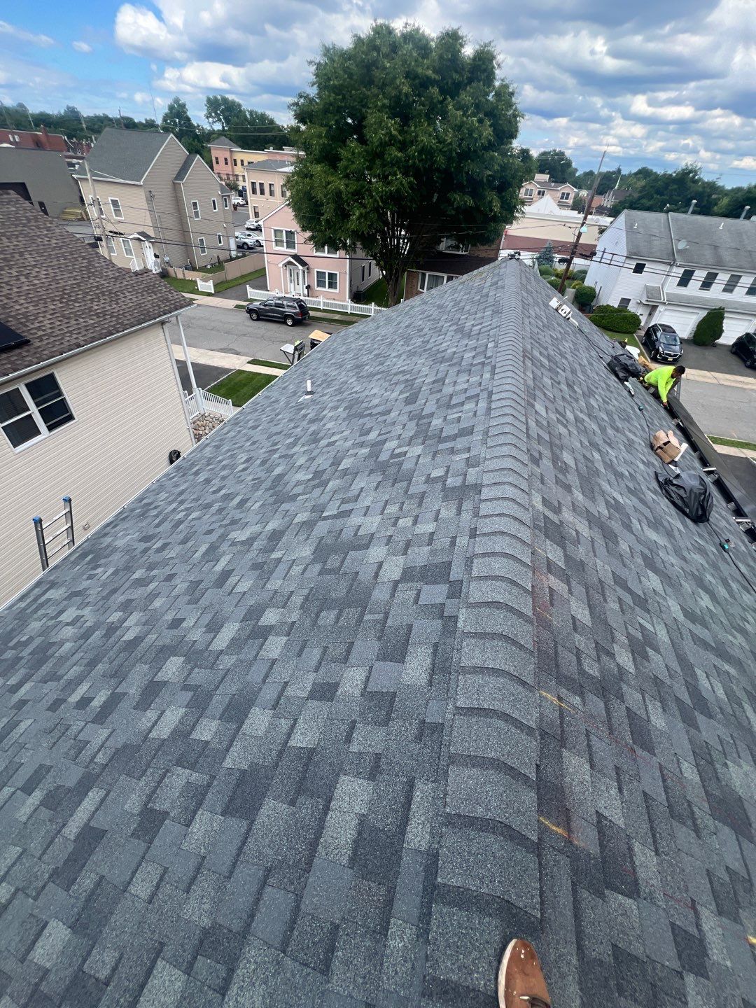 Charcoal Shingles by Reimagine Roofing