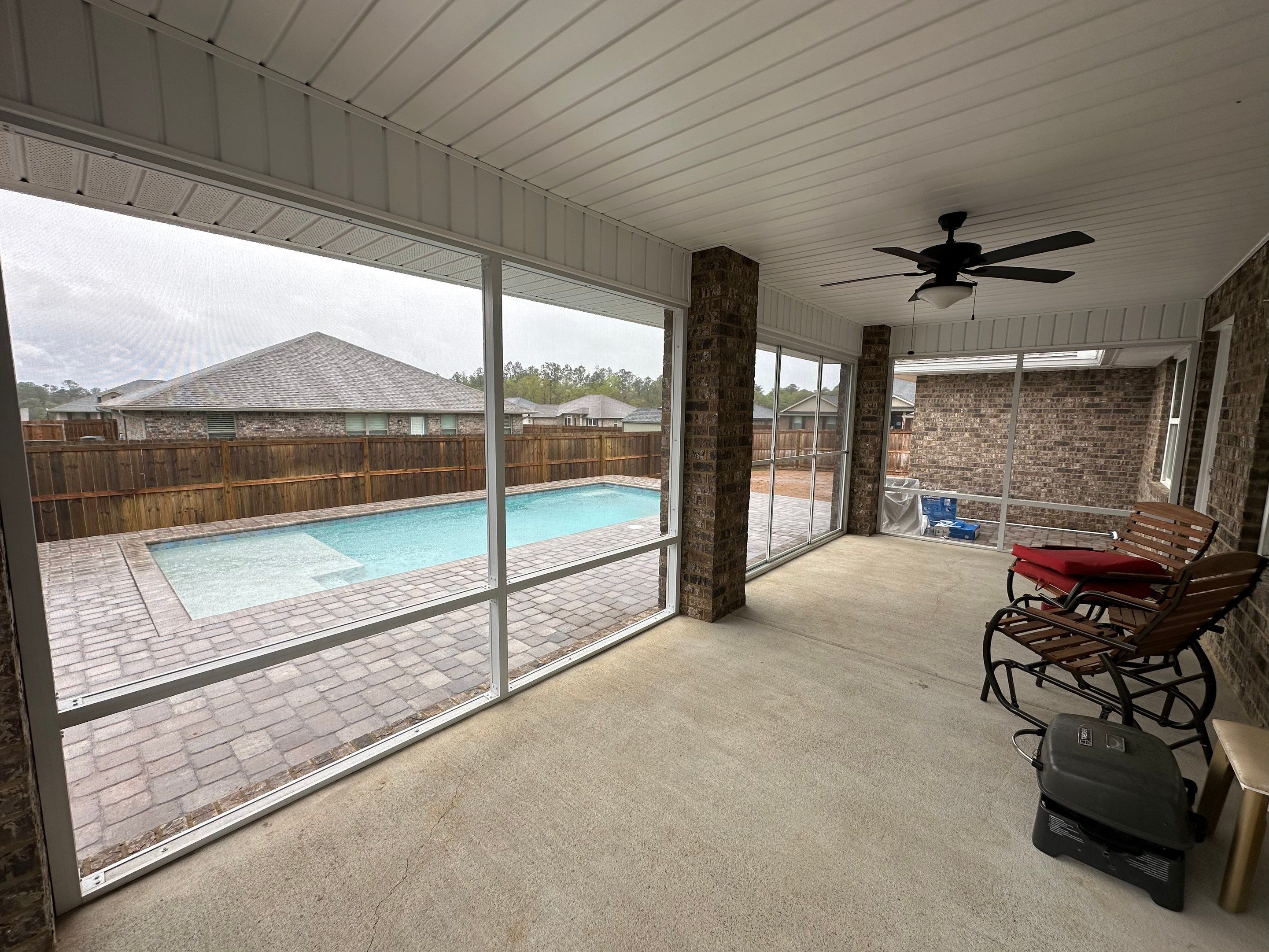 Poolside Screen Room Under Existing Patio Cover by Titan Sunrooms