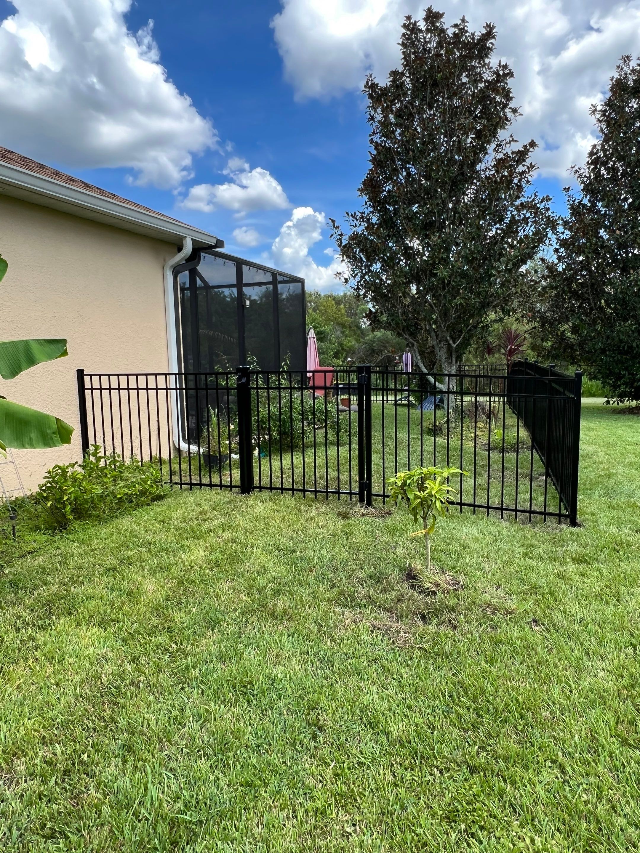 Black Aluminum Fence Installation in Bradenton, FL by Asap fence and gates, LLC