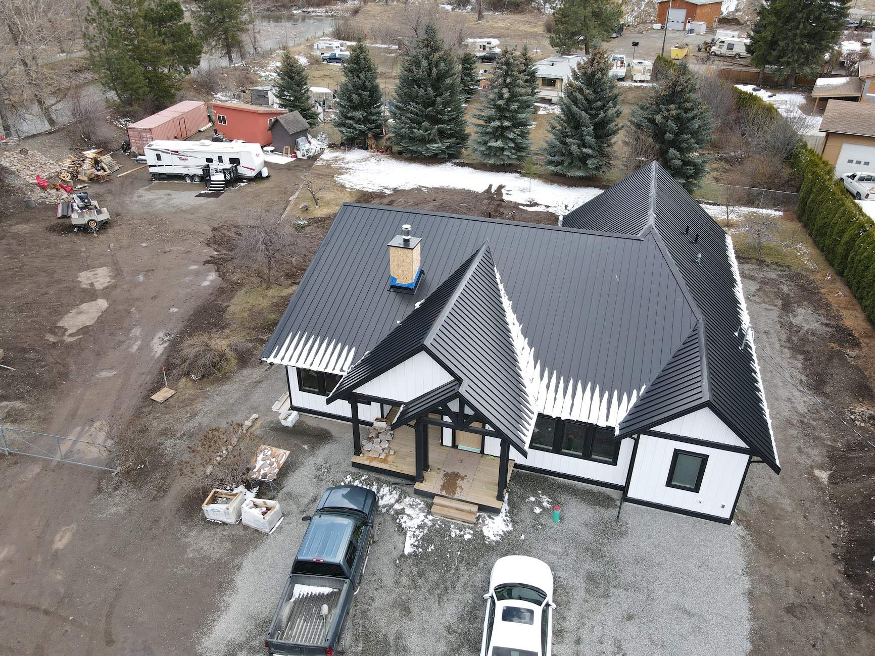 Residential Roofing Installation using 12" Prolok metal  by Top Notch Roofing Inc