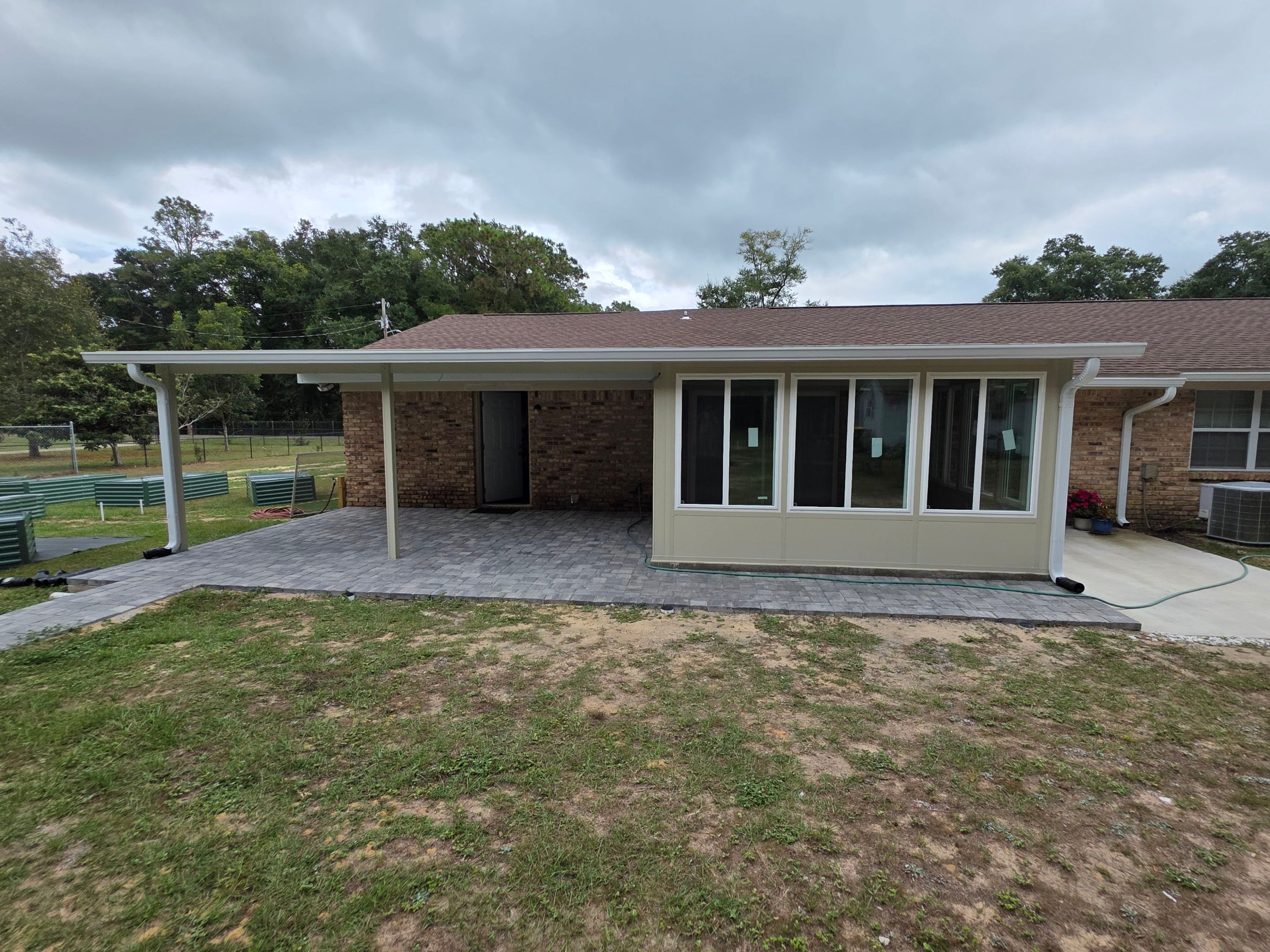 Sunroom Addition and Covered Patio by Titan Sunrooms