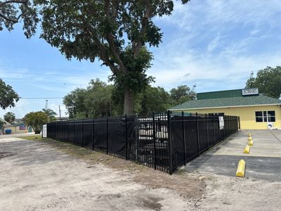 Aluminum Fence Installation using Black 3 Rail Aluminum Fence