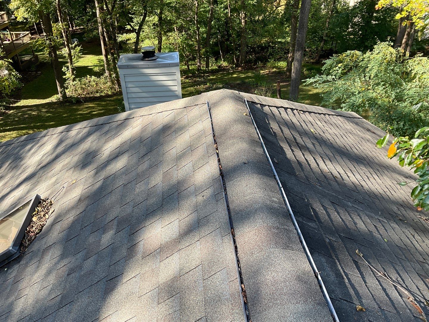 Install new shingles and new skylights  by Alpha Design Services