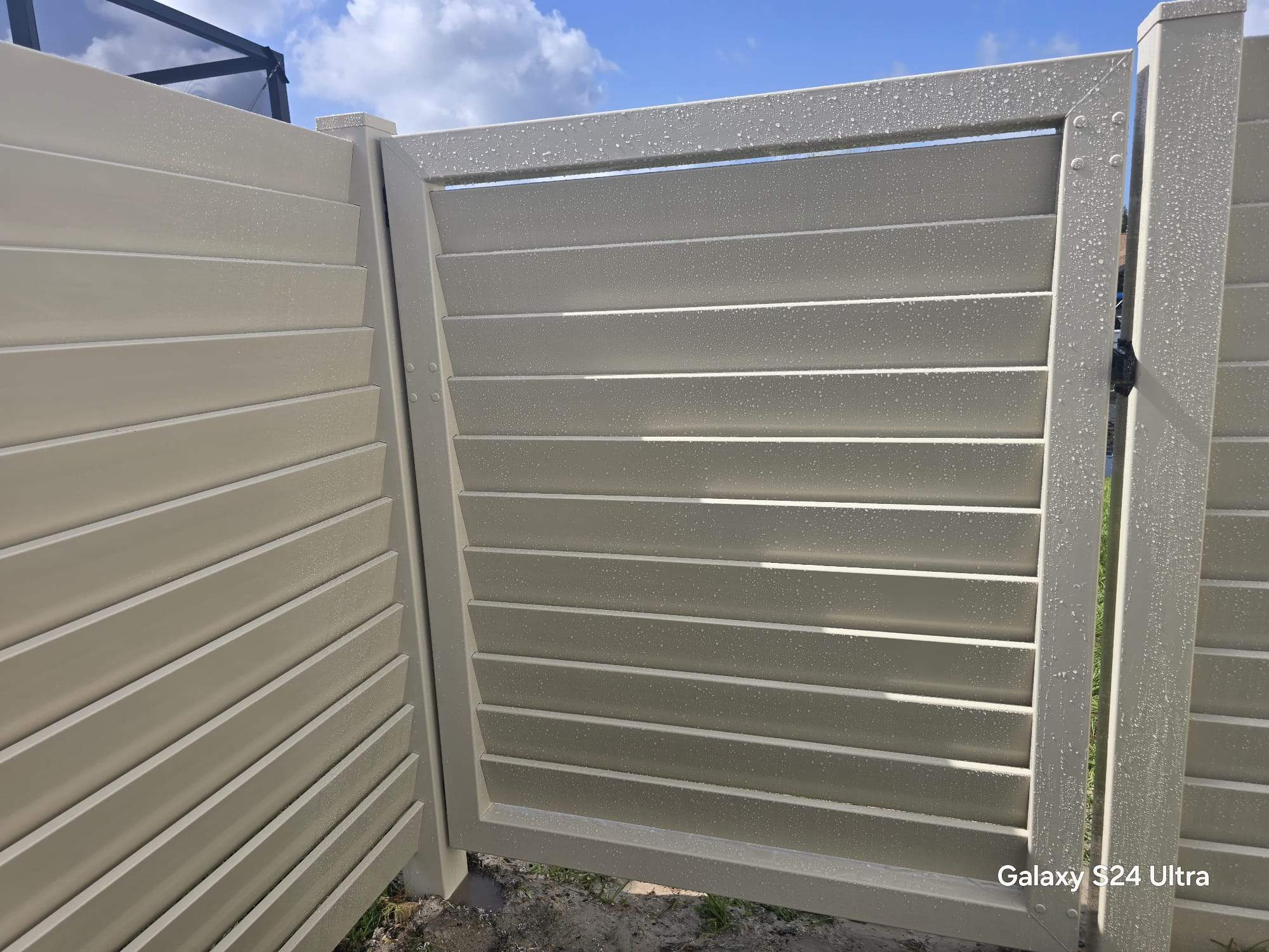 Tan Louvered Vinyl in Port Charlotte by True Fence LLC