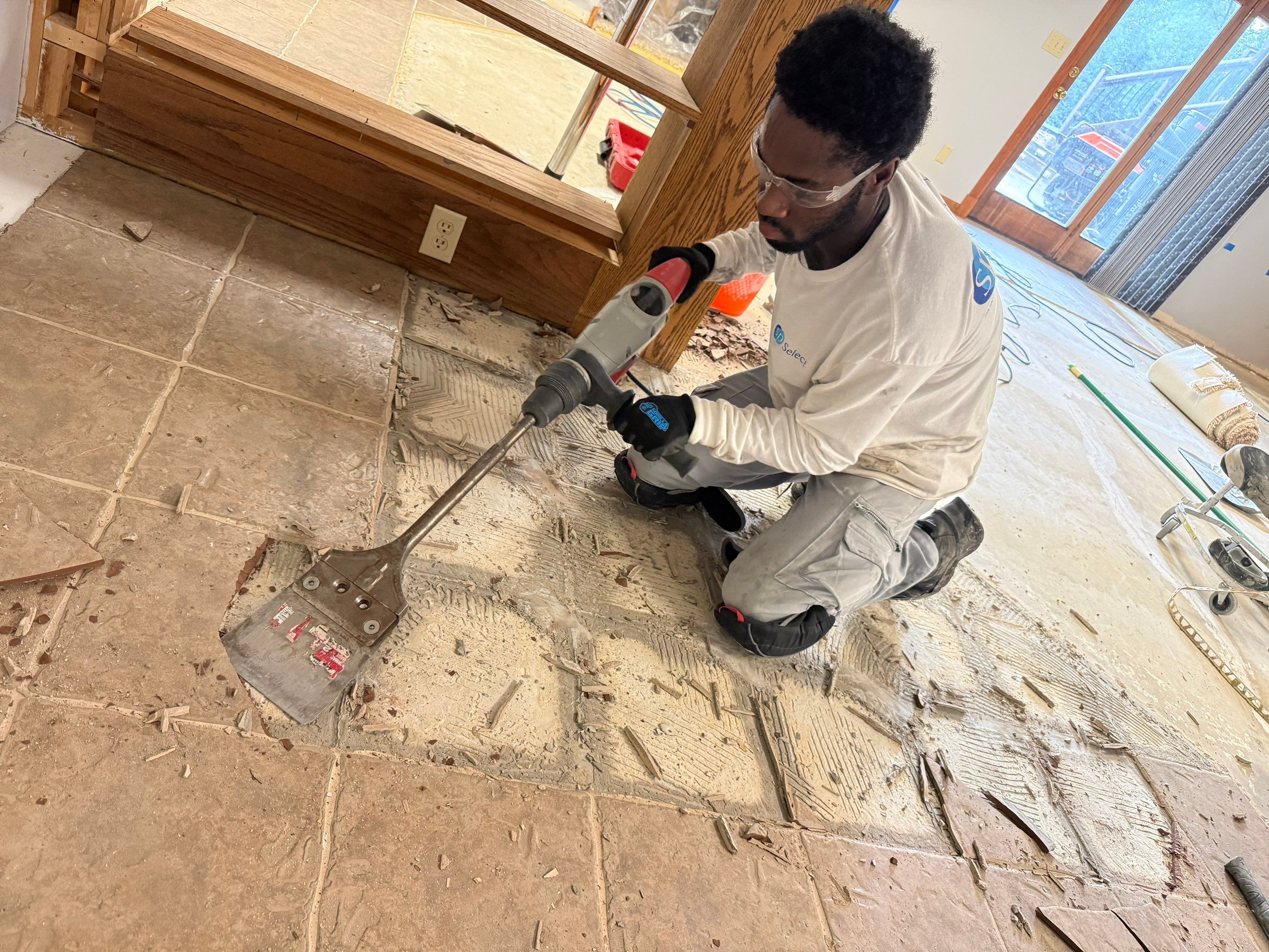 Solid Color Concrete Floor Coating for Renner Basement by Select Painting, Coatings & Garage Cabinets