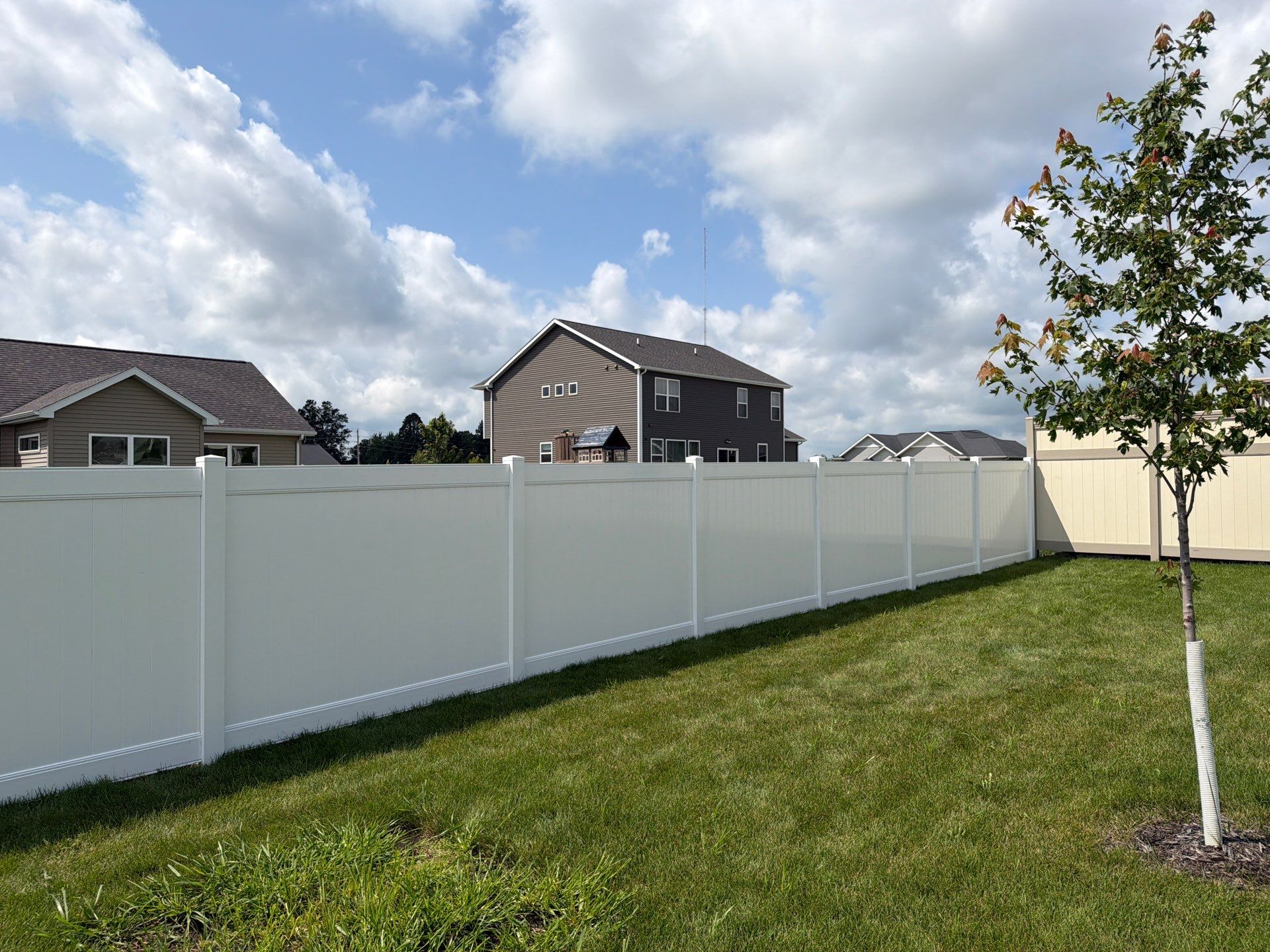 New Vinyl Privacy Fencing and Gates for Waterloo Residential Backyard by Perfect Picket Fence and Stain
