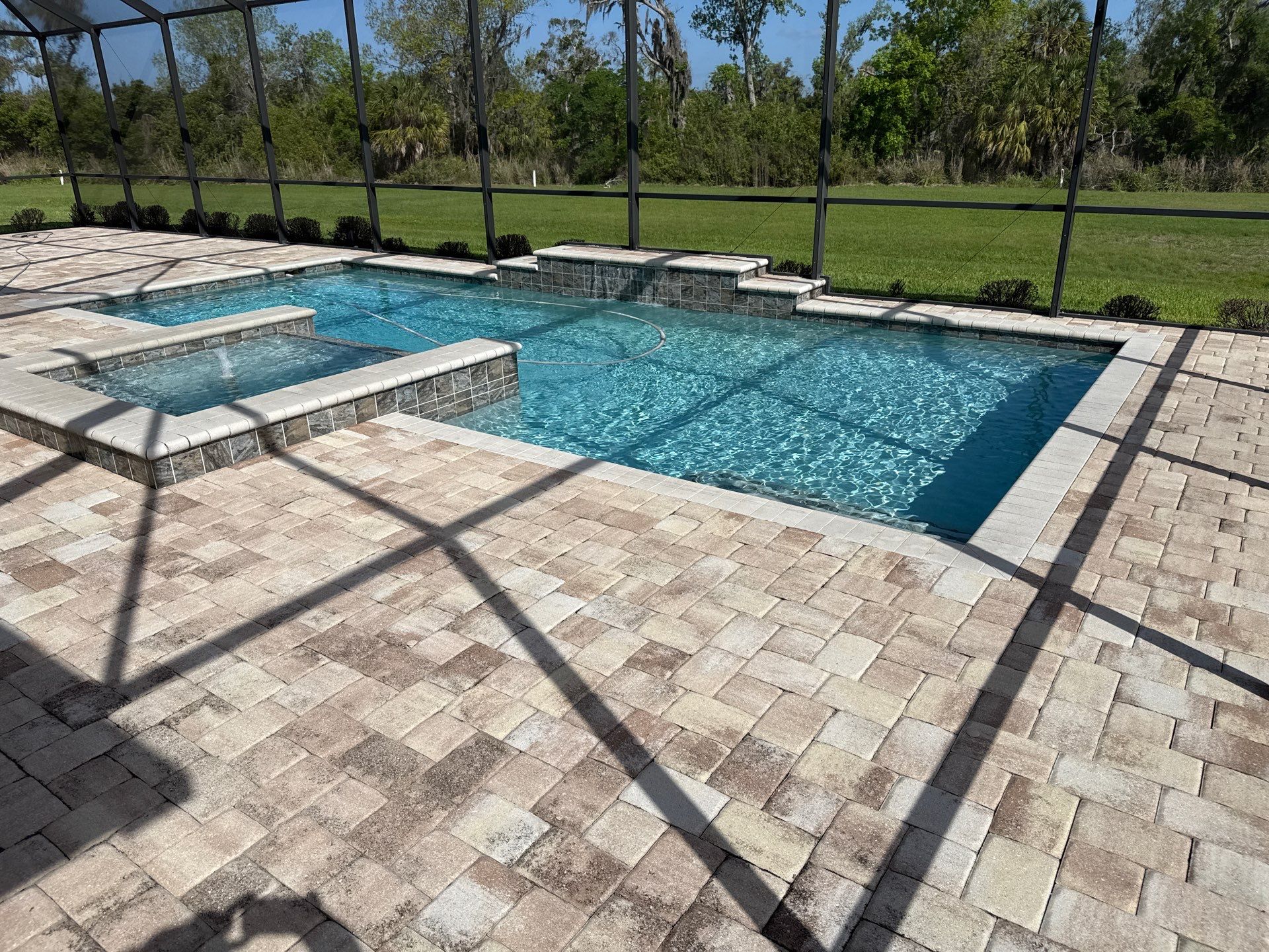 We recently completed a tile roof cleaning in the Vivienda at Bradenton community. The roof had visible algae buildup, which is common in Florida’s humid climate—especially on shaded areas.  For this project, we safely cleaned the roof using a ladder and ground-based soft wash application—no walking on the tile roof. This approach helps prevent cracked or broken tiles while still delivering a thorough, even cleaning.  Our soft washing process targets and eliminates algae at the root, restoring the roof’s appearance and helping extend its lifespan.  At Sunshine AquaWash, we prioritize safety, proper technique, and long-lasting results on every roof cleaning project. by Sunshine AquaWash