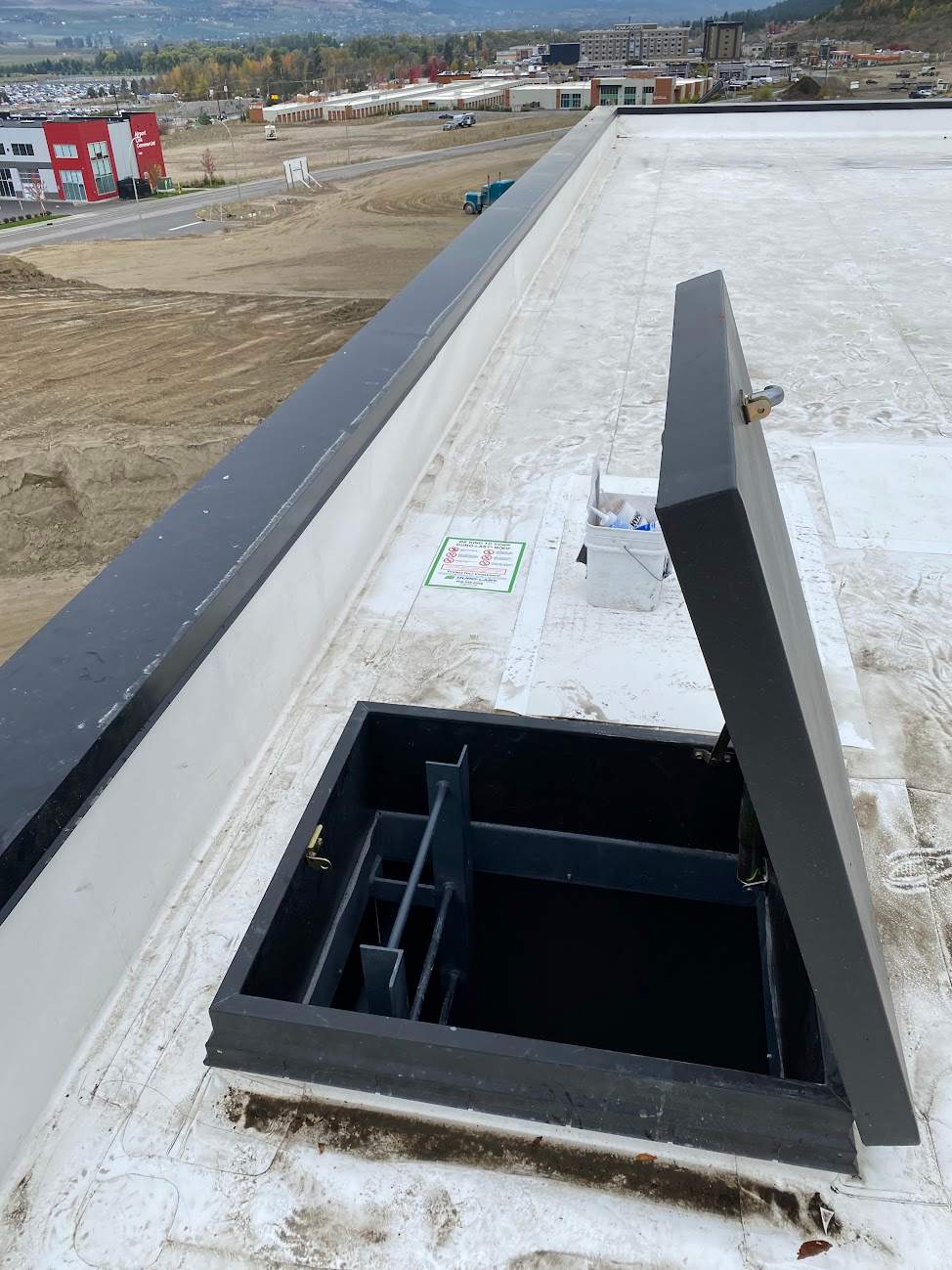 Commercial Roofing Installation using Durolast by Top Notch Roofing Inc