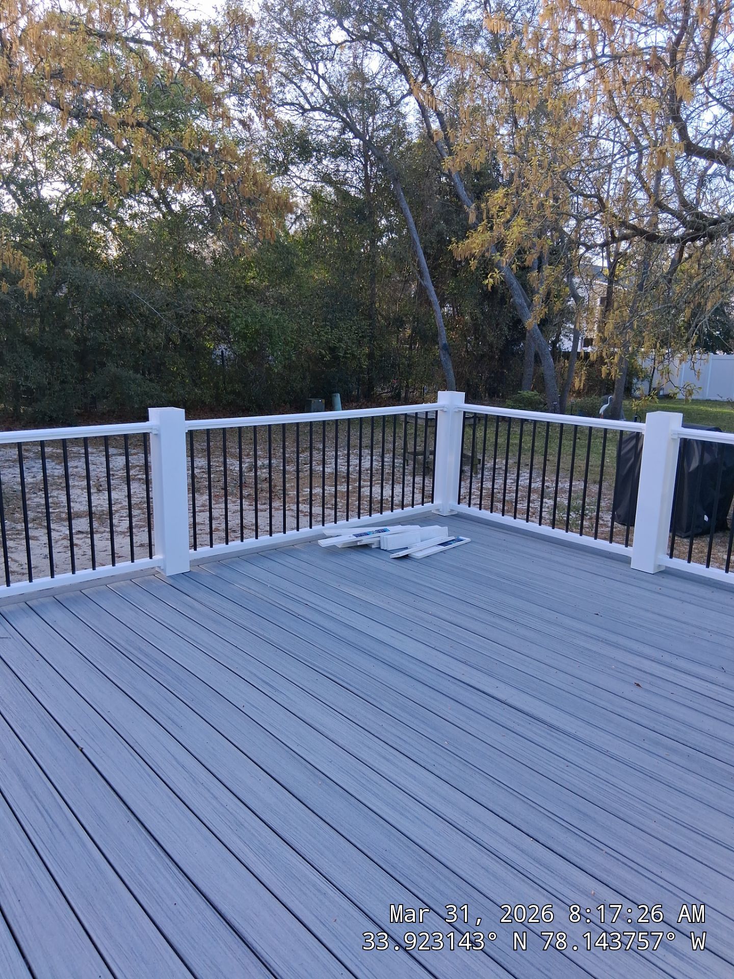 Oak Island Composite Deck Build with Trex Decking and Coastal Railings by RGR Construction and Roofing, LLC