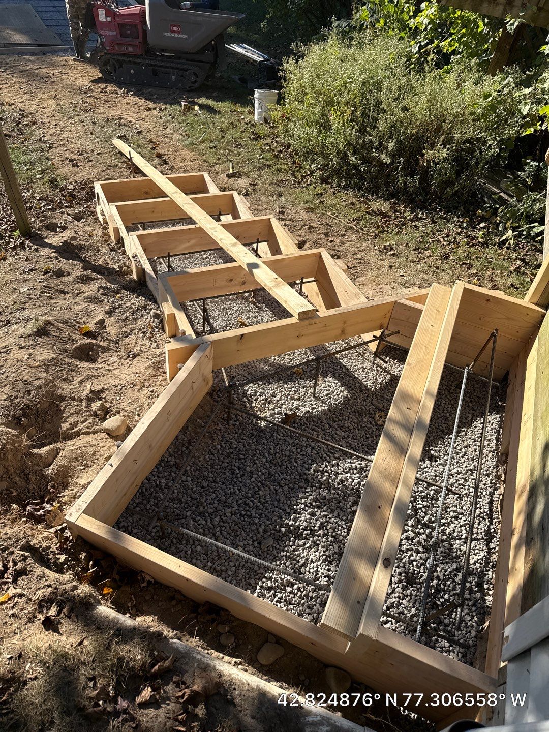 Broom finished concrete pad and steps  by NG Masonry & Construction LLC