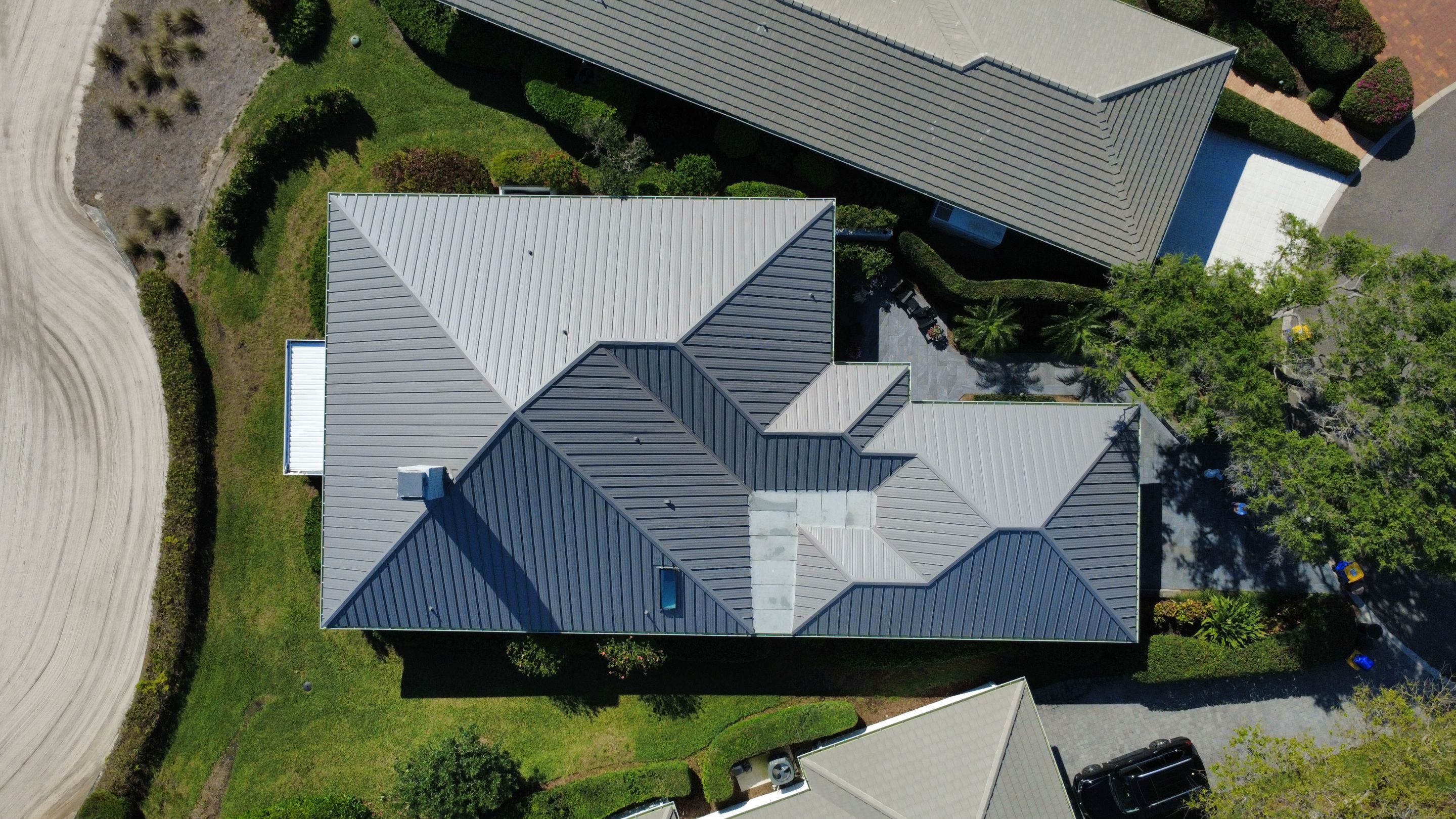 Kynar (Color Coated) 1.5" Standing Seam Metal Roof Installation by Sailfish Roofing