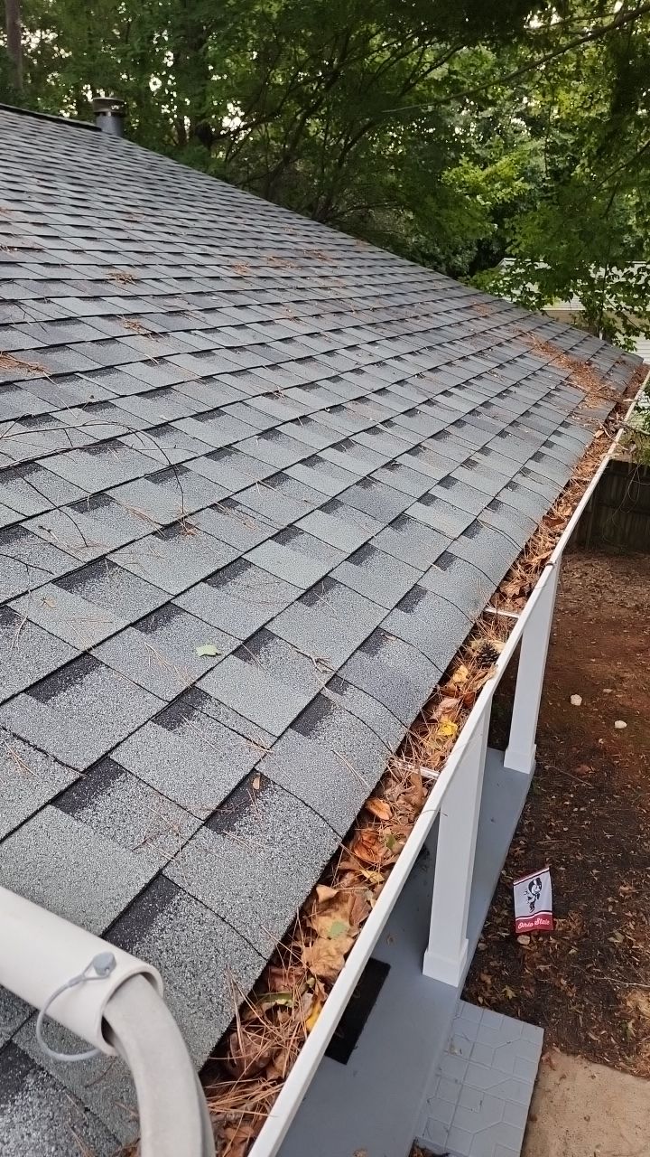 Gutter Cleaning using water by Power Wash Masters LLC