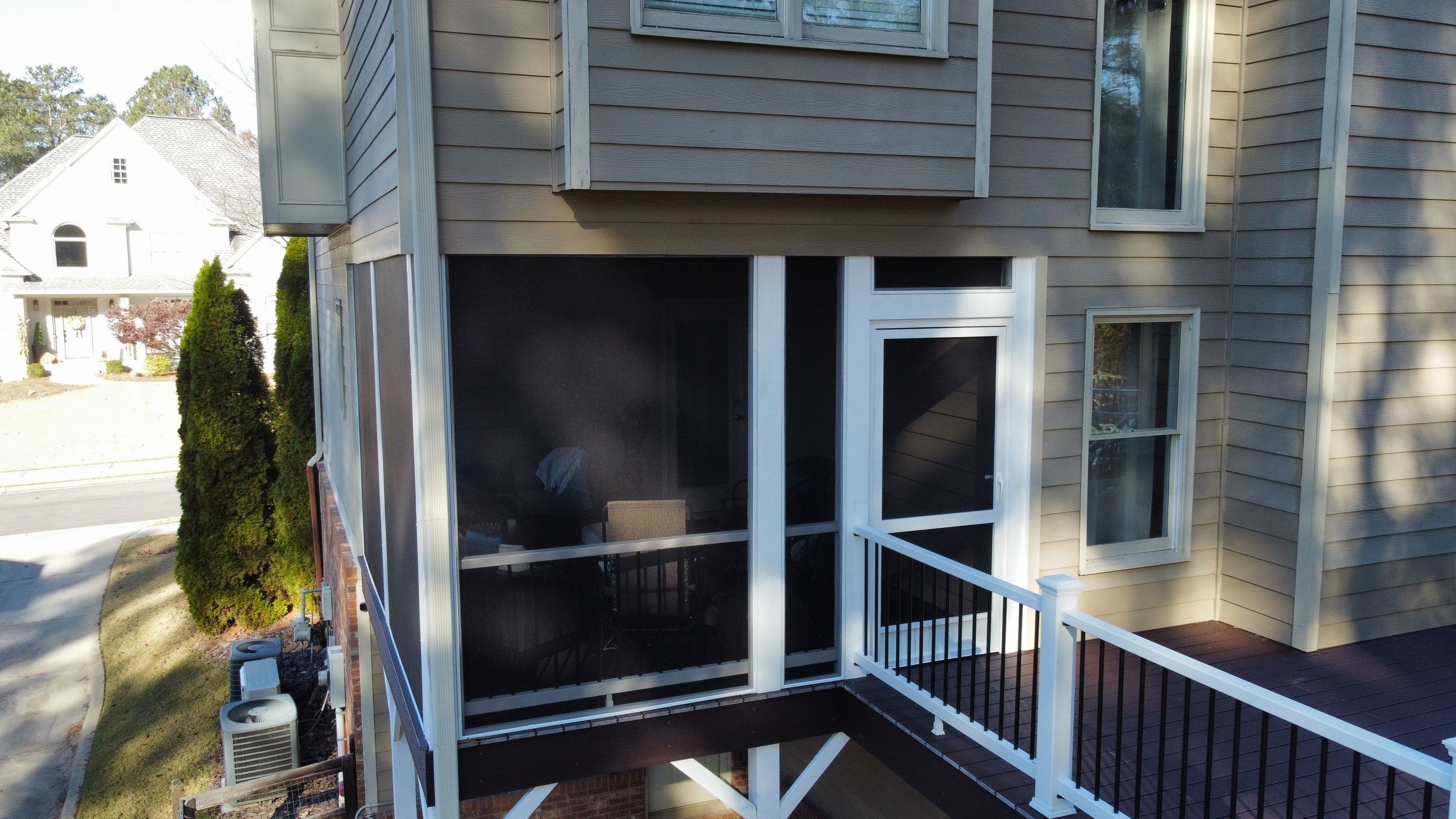 Multi-Level Composite Deck and Screened Porch in Acworth by Swift Home Renovations 