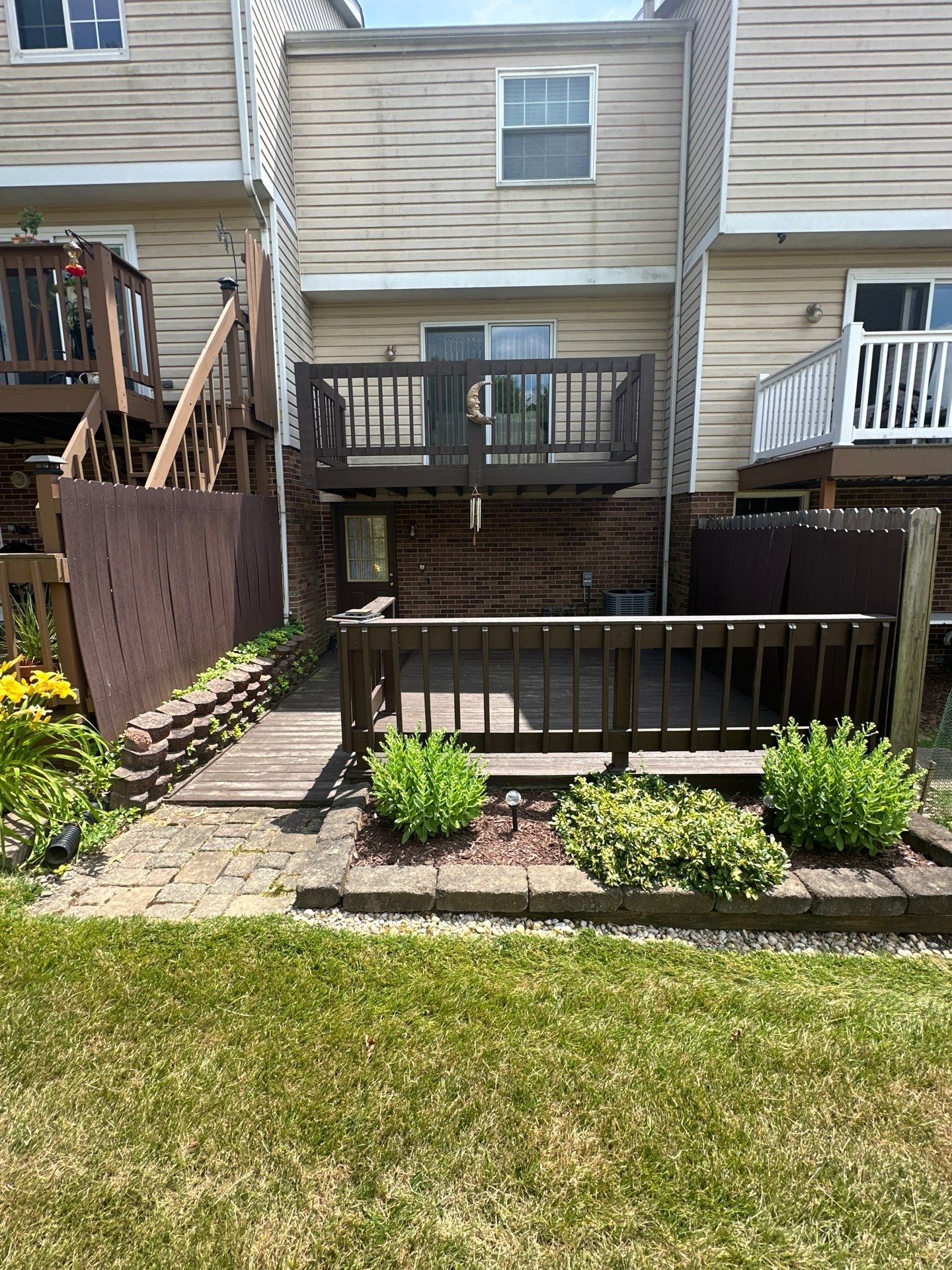 Stamped concrete and redeck  by Cousins Roofing Siding & Decks