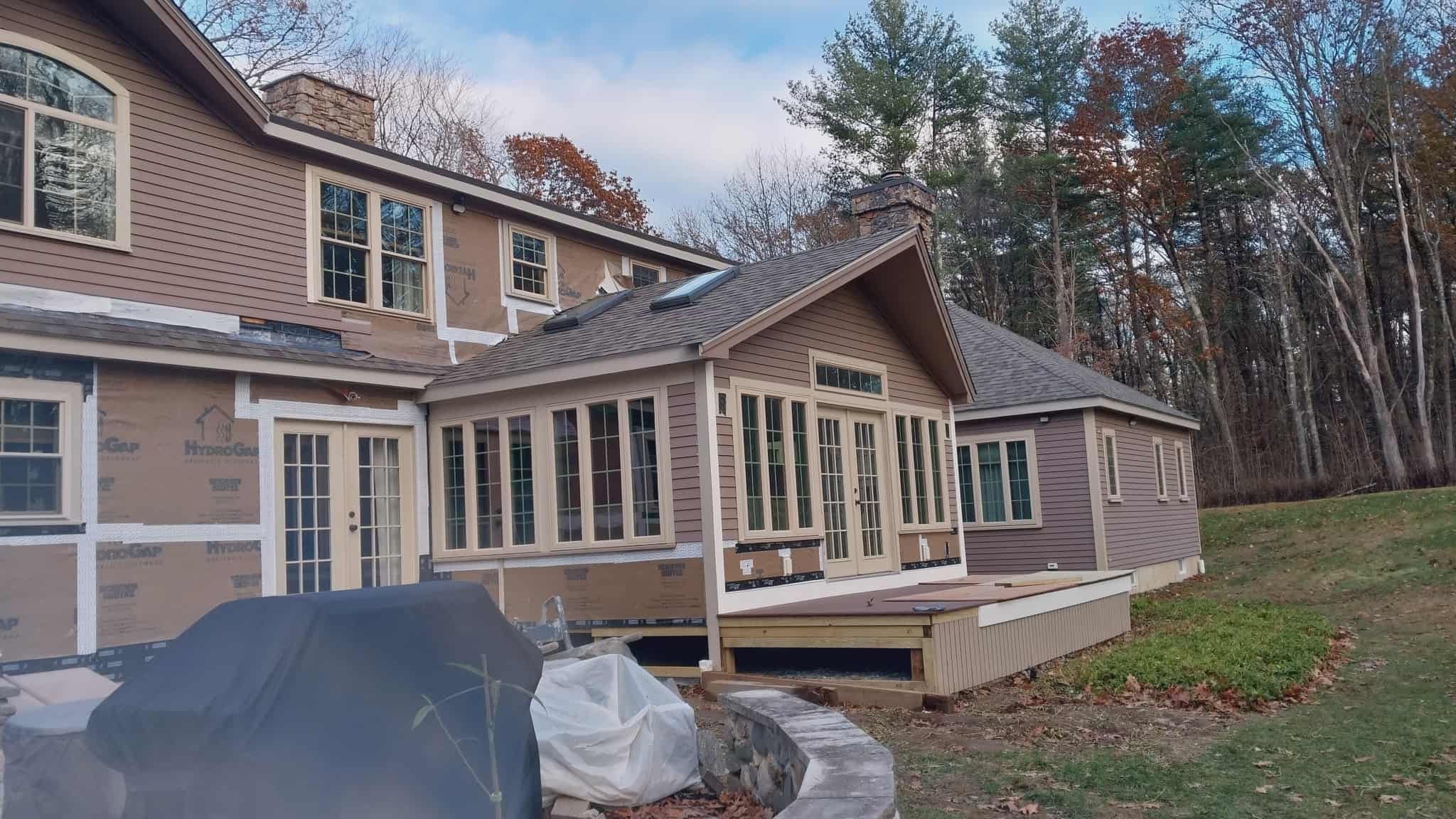 Complete House & Barn Roof with 13 Skylight Reflashing + EPDM Repairs by Mighty Dog Roofing of Greater Middlesex County