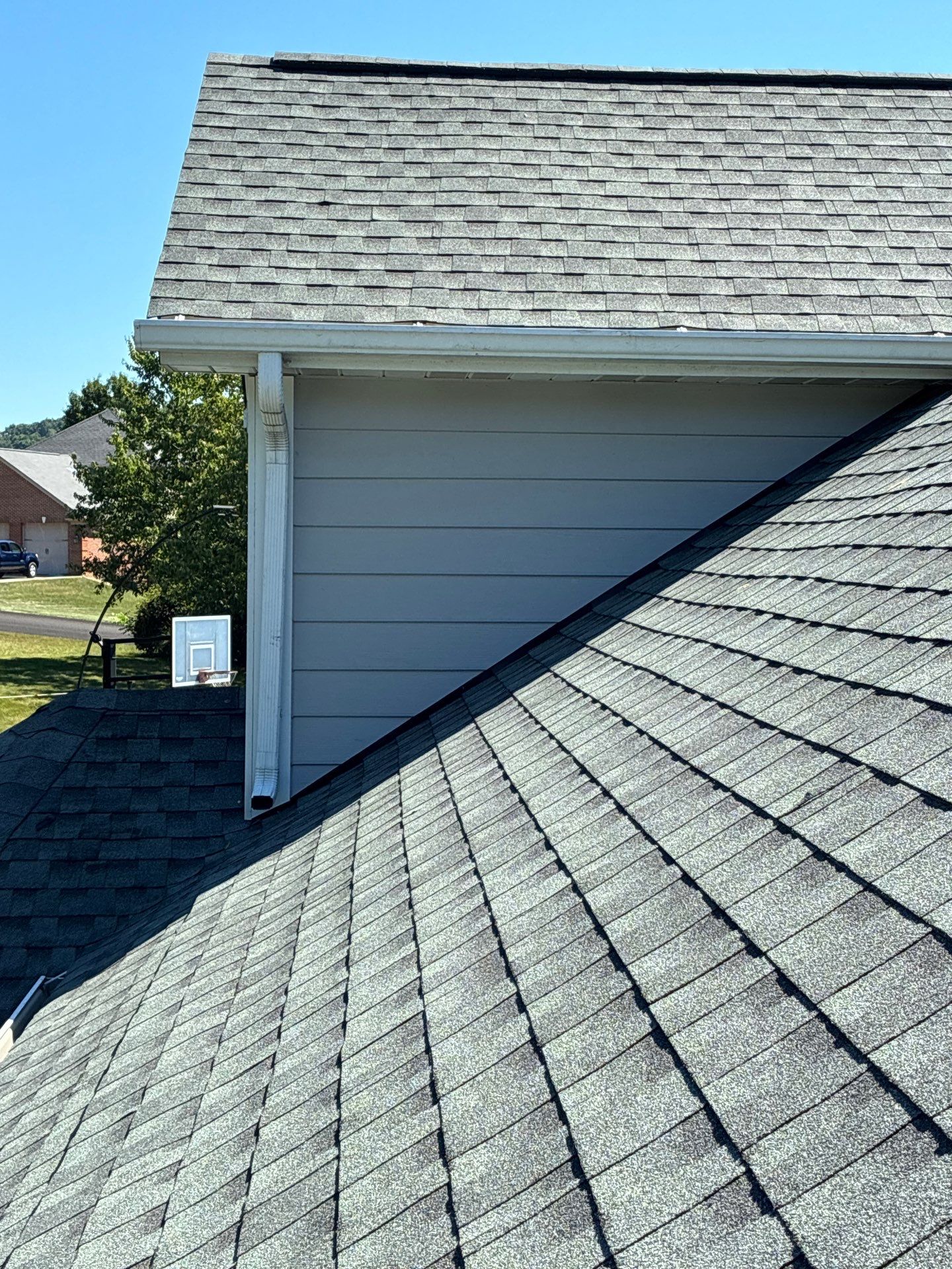 Full Roofing Replacement and Gray Shake Hardie Siding Installation in Butler by Cousins Roofing Siding & Decks