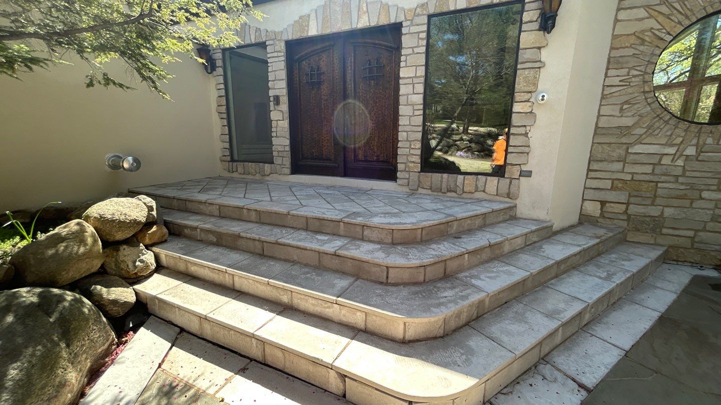 natural stone using Algaecide, soft wash soap by Northern Power Washing LLC.