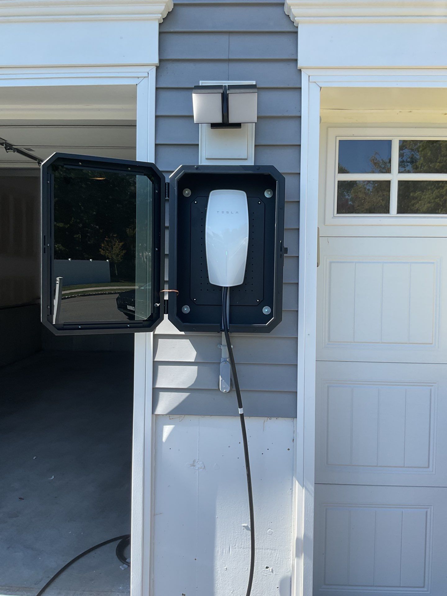 Exterior EV Charger Installed with PVC Conduit – Powered by ZAM by ZAM Electric