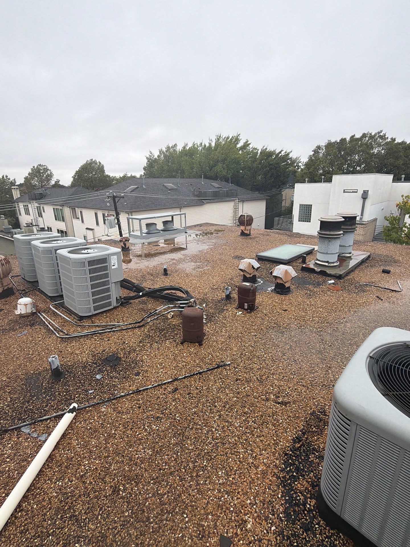 Comprehensive Roof Replacement for Dallas Residential Flat Gravel System
