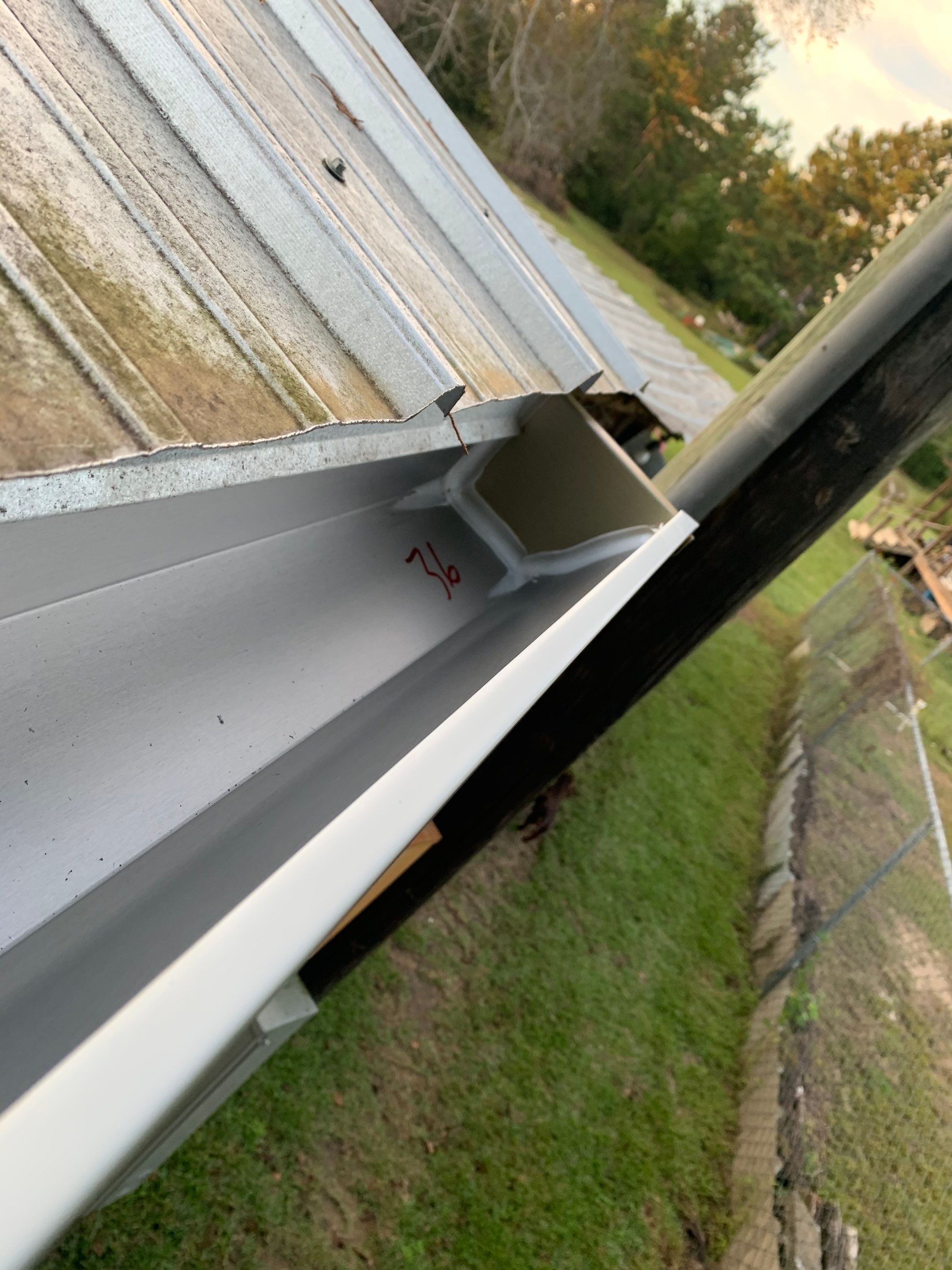 Gutter Installation using K-Style Seamless Gutters by Gutter Professors