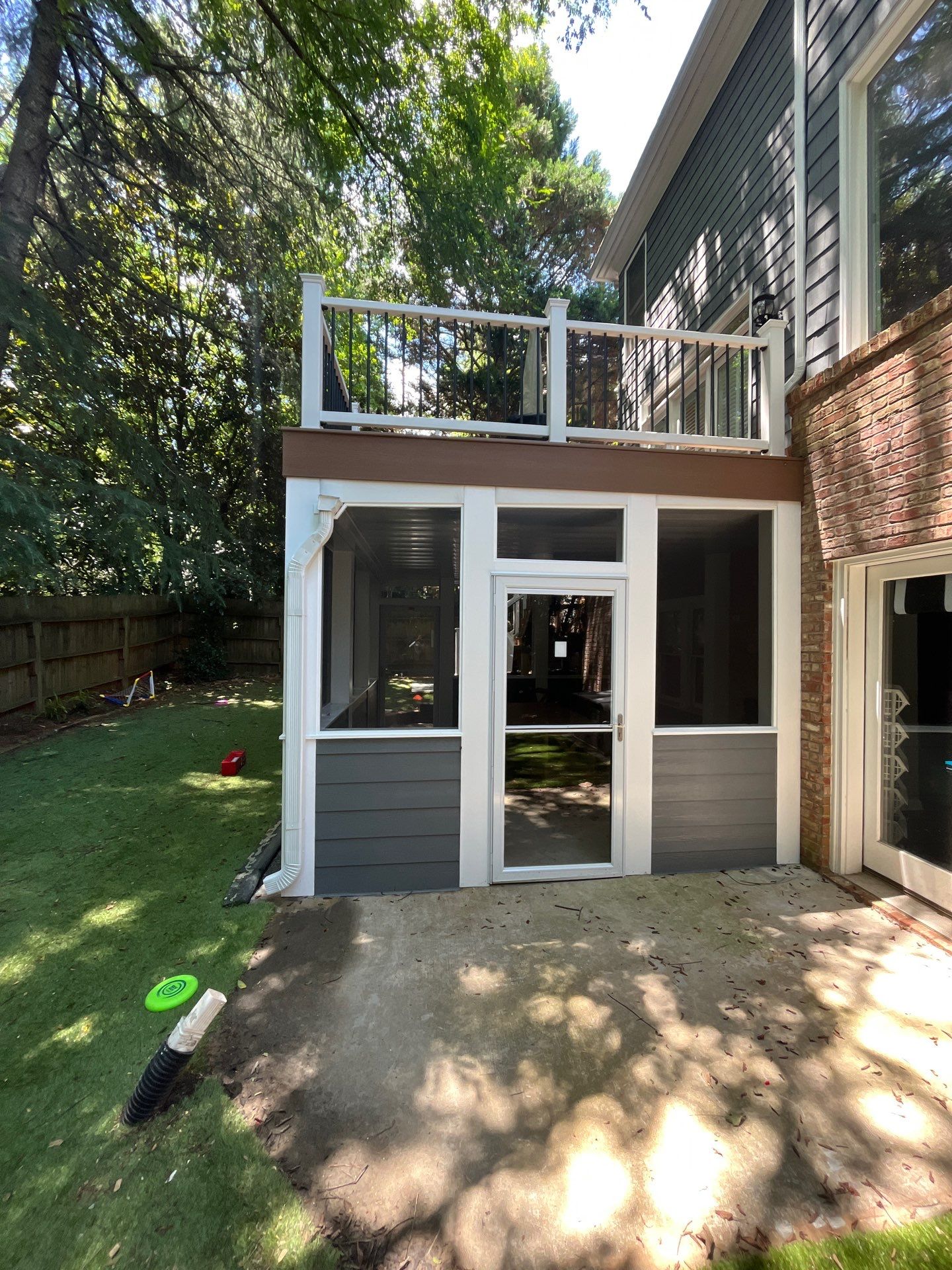 Trex New Deck Build with Screened in Under Deck by Nelson Exteriors 