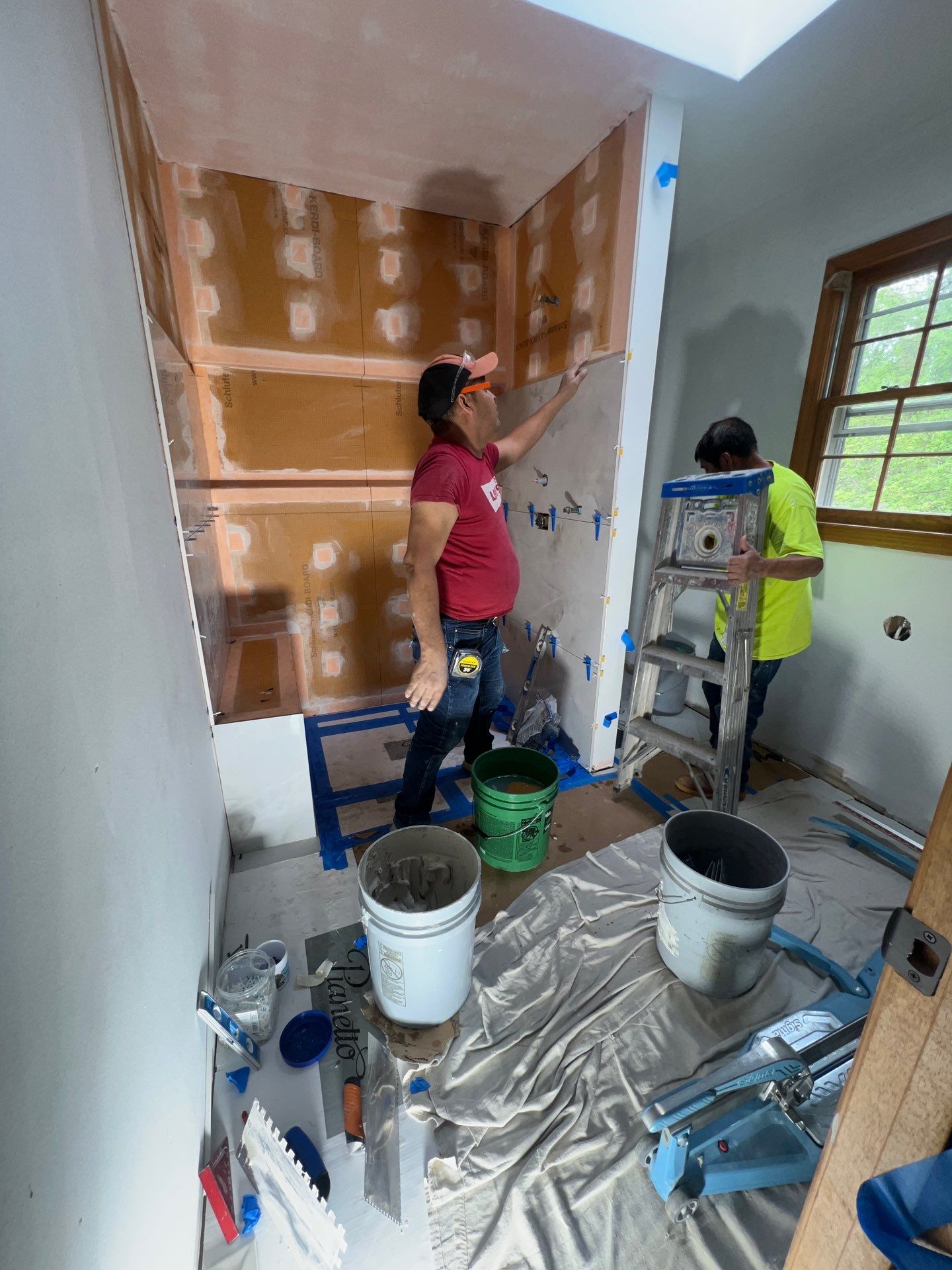 Modern Bathroom Remodeling Featuring Marble Tiles and Custom Cabinetry in Smyrna by Swift Home Renovations