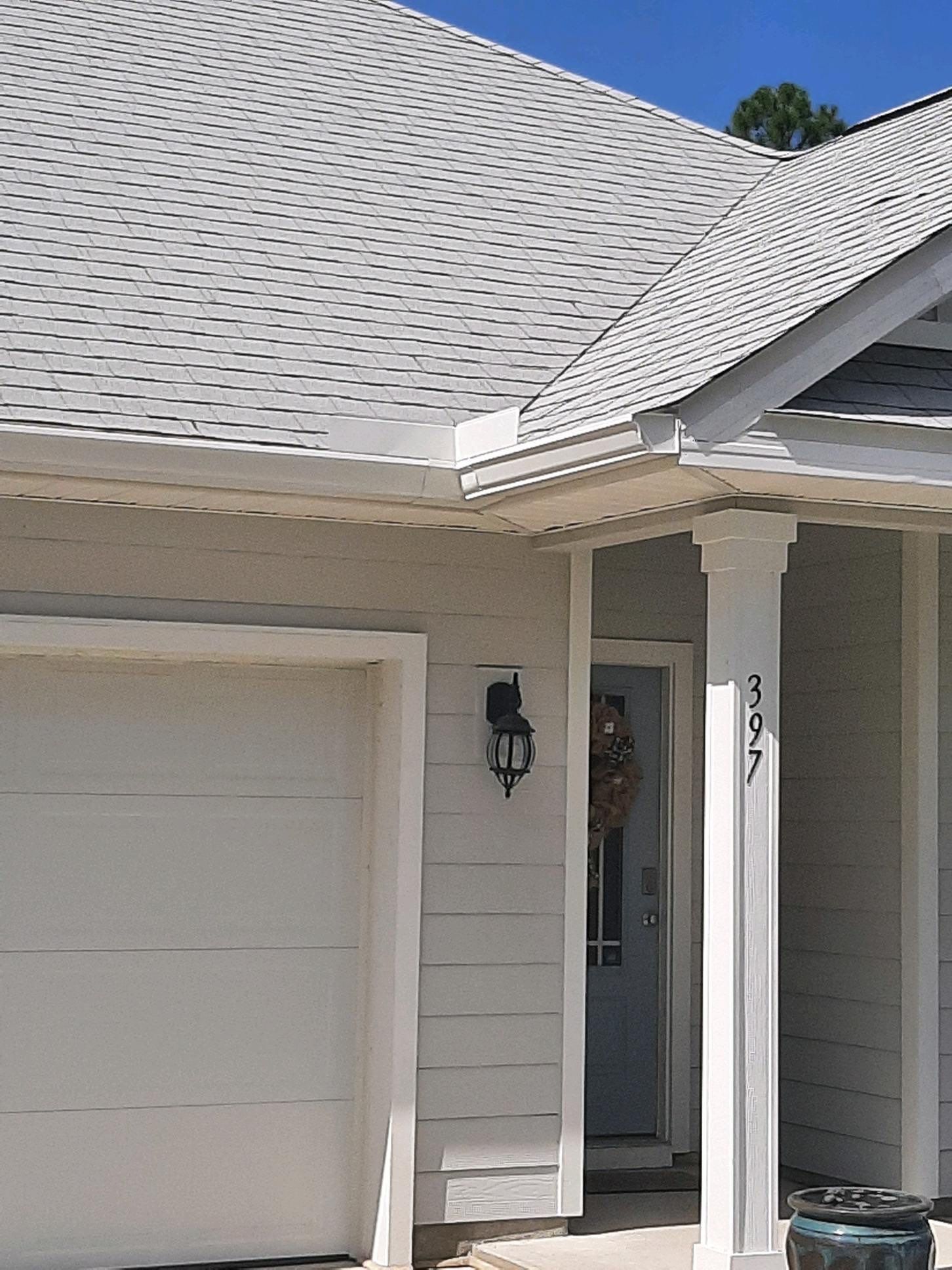 Seamless Gutter Installation using White by Gutter Professors