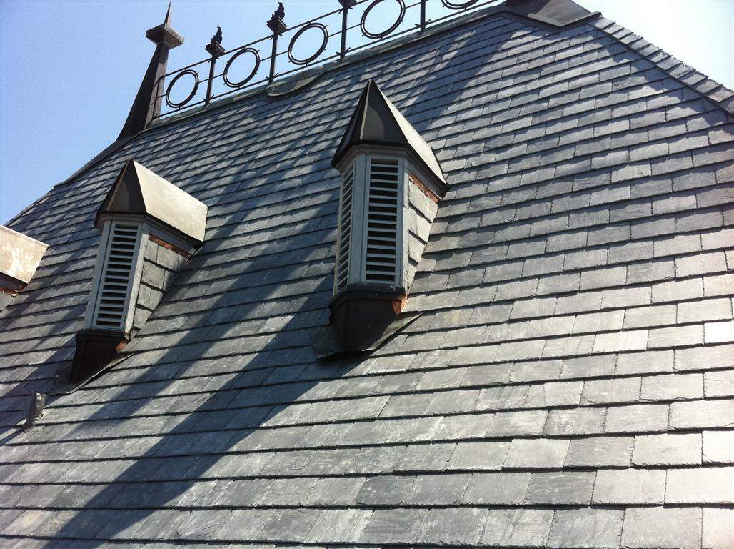 Historic Building ROOF REPLACEMNT with GAF TruSlate  on steep slop and Versico 60mil TPO on flat roof by Gorilla Exteriors Contracting, LLC