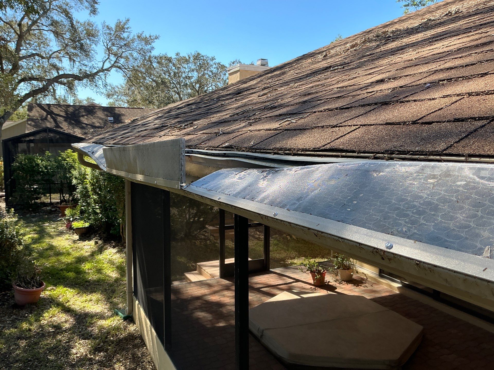 Gutter Guard Installation + New Downspouts in Sarasota FL by Gutter Professors