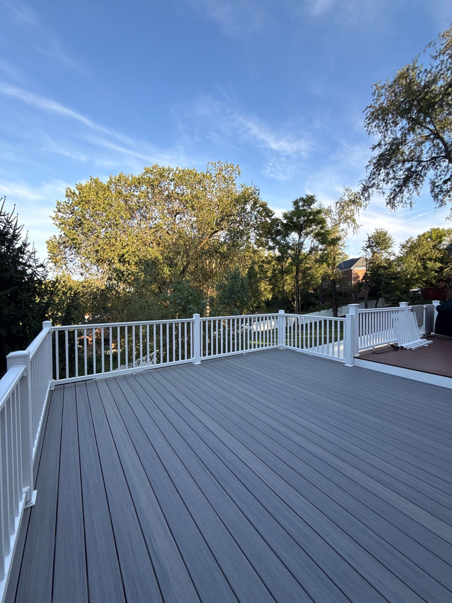 Deck extension  by Cousins Roofing Siding & Decks