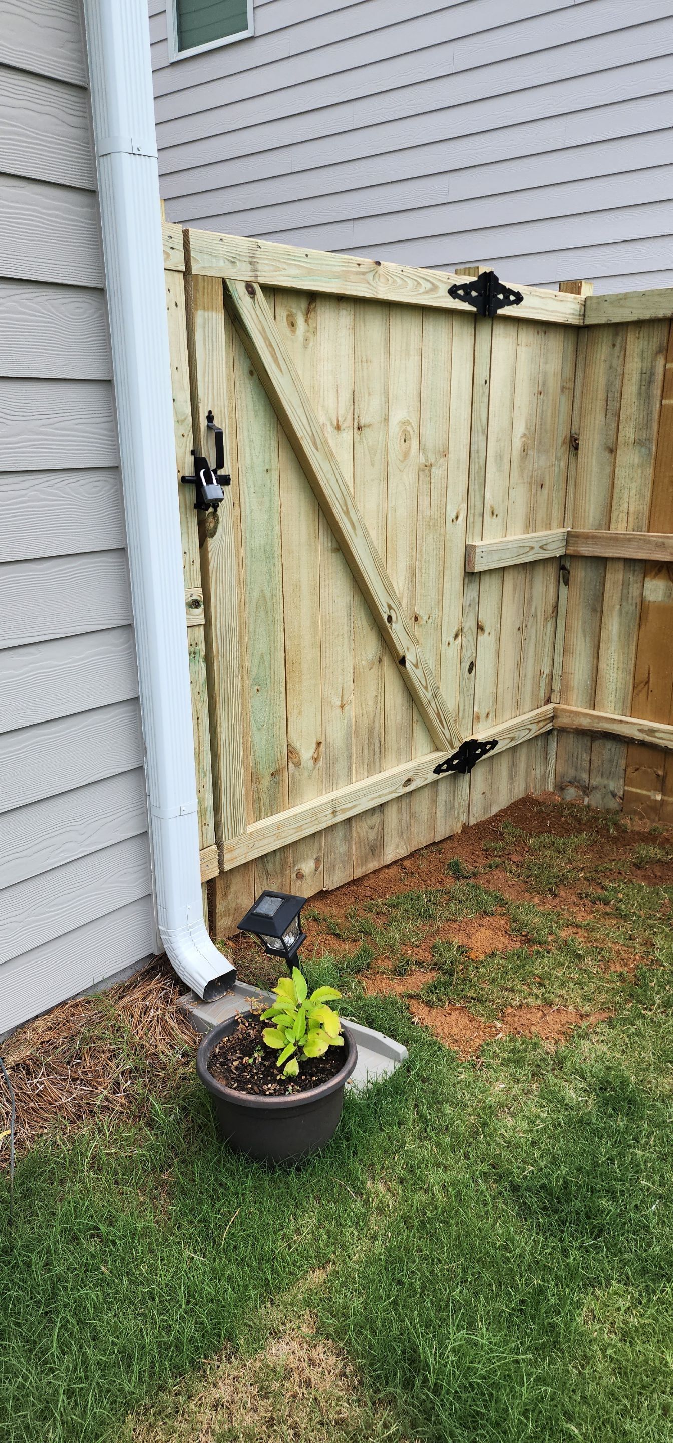 Fence Installation of Capped Wood Privacy by Titans of Timber Fence & Stain
