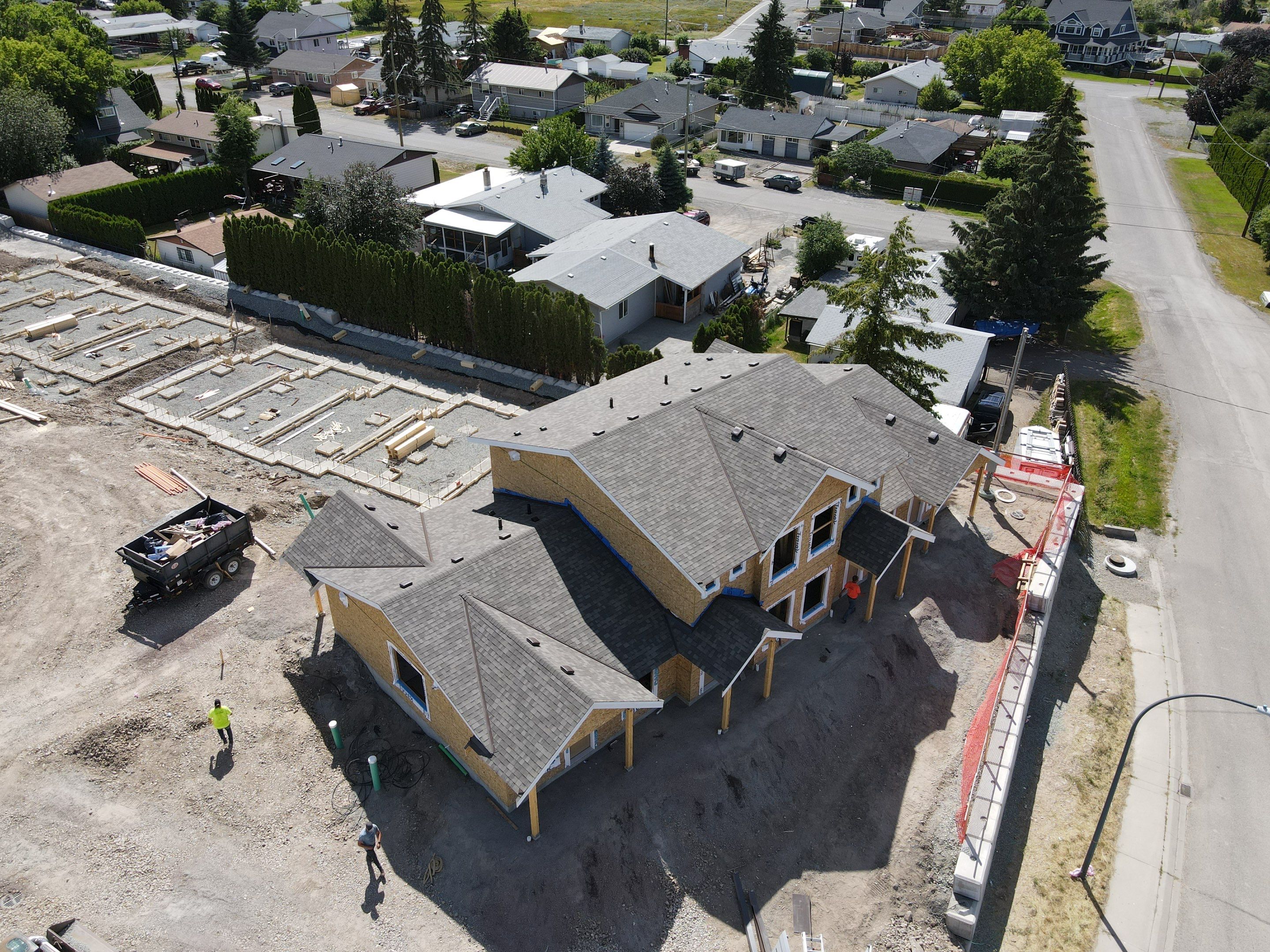 Residential Roofing Installation using OC Oakridge shingles by Top Notch Roofing Inc