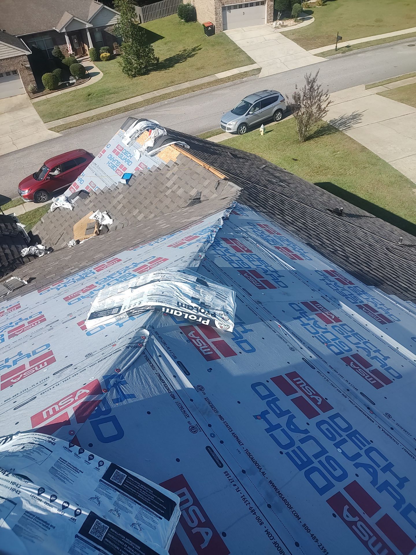 Residential Roof Replacement using ATLAS PROLAM WEATHER WOOD by Elite Roofing LLC