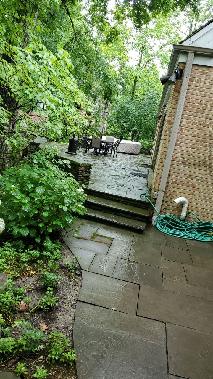 Bluestone patio cleaning by Northern Power Washing LLC.