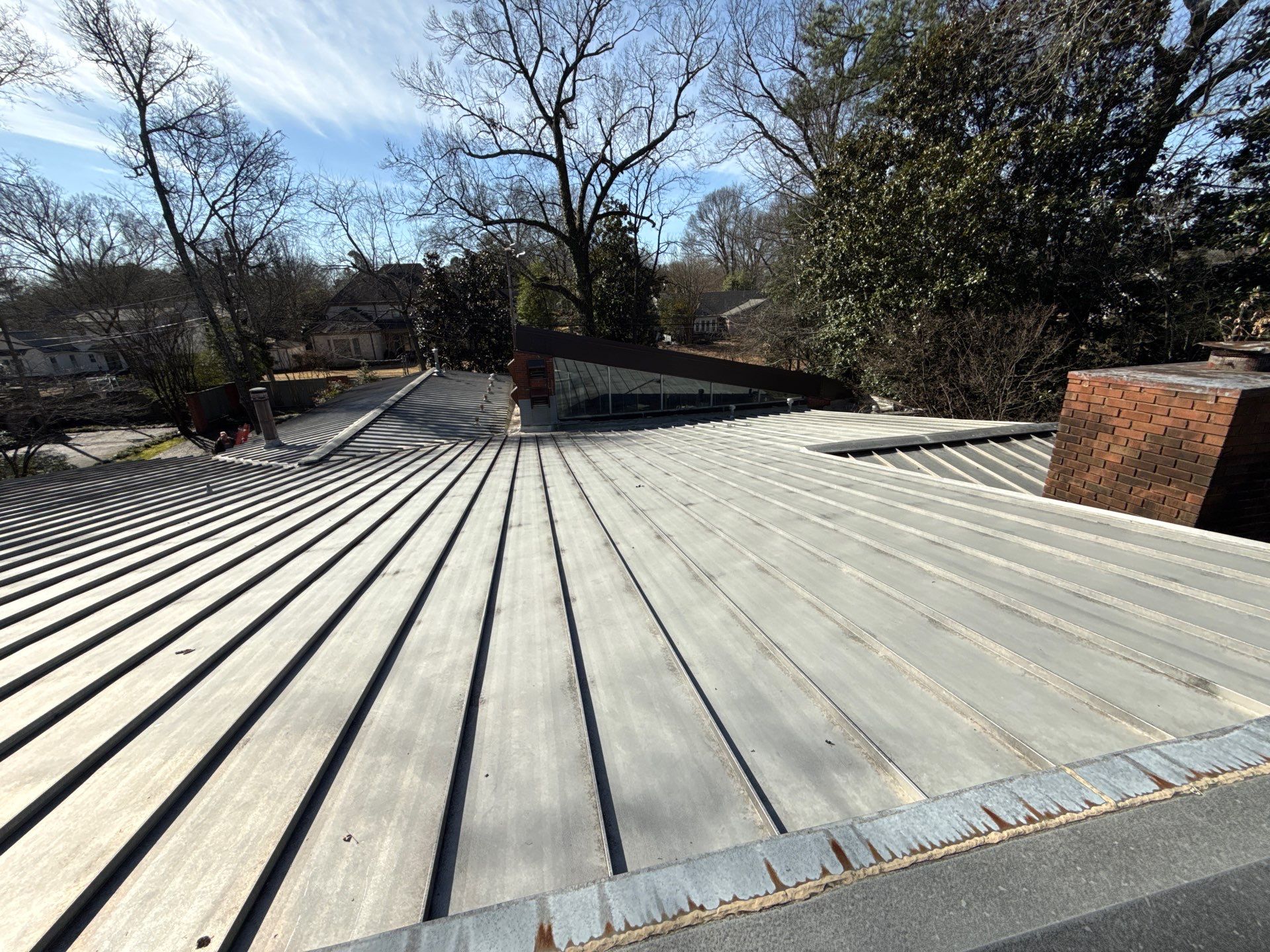 Residential Standing Seam Metal Roof and Membrane Replacement in Memphis by Revival Roofing Services