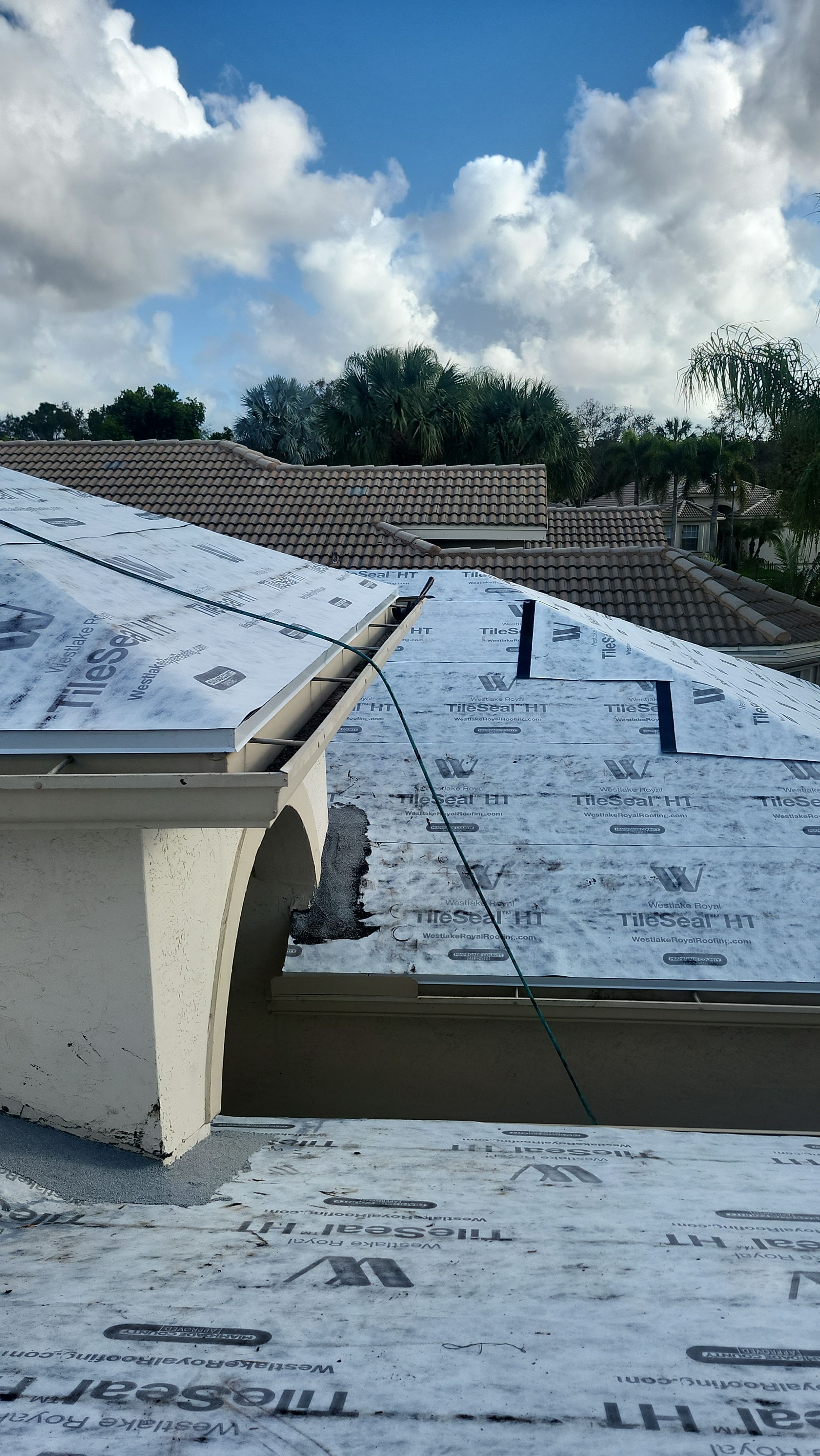 Full Concrete S-Tile Roof Replacement and Deck Repair in Wellington by Aastro Roofing