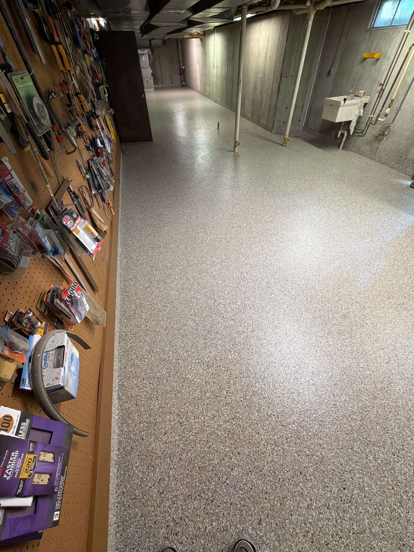Full Basement and Garage Epoxy Flake Floor Installation in North Muskegon by Gordon Painting