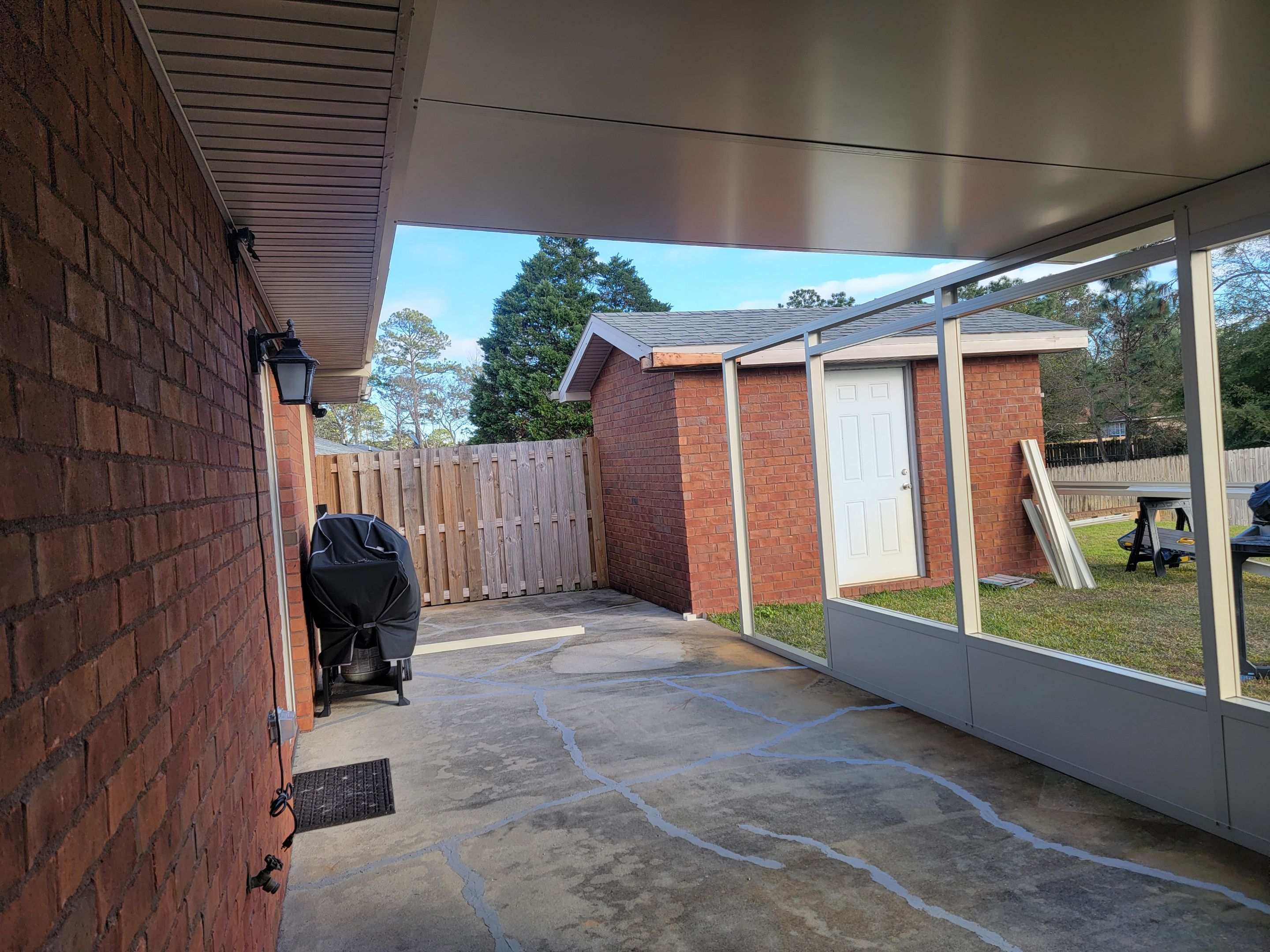 Enclosure w/Vinyl Windows using Colorbeam by Titan Sunrooms