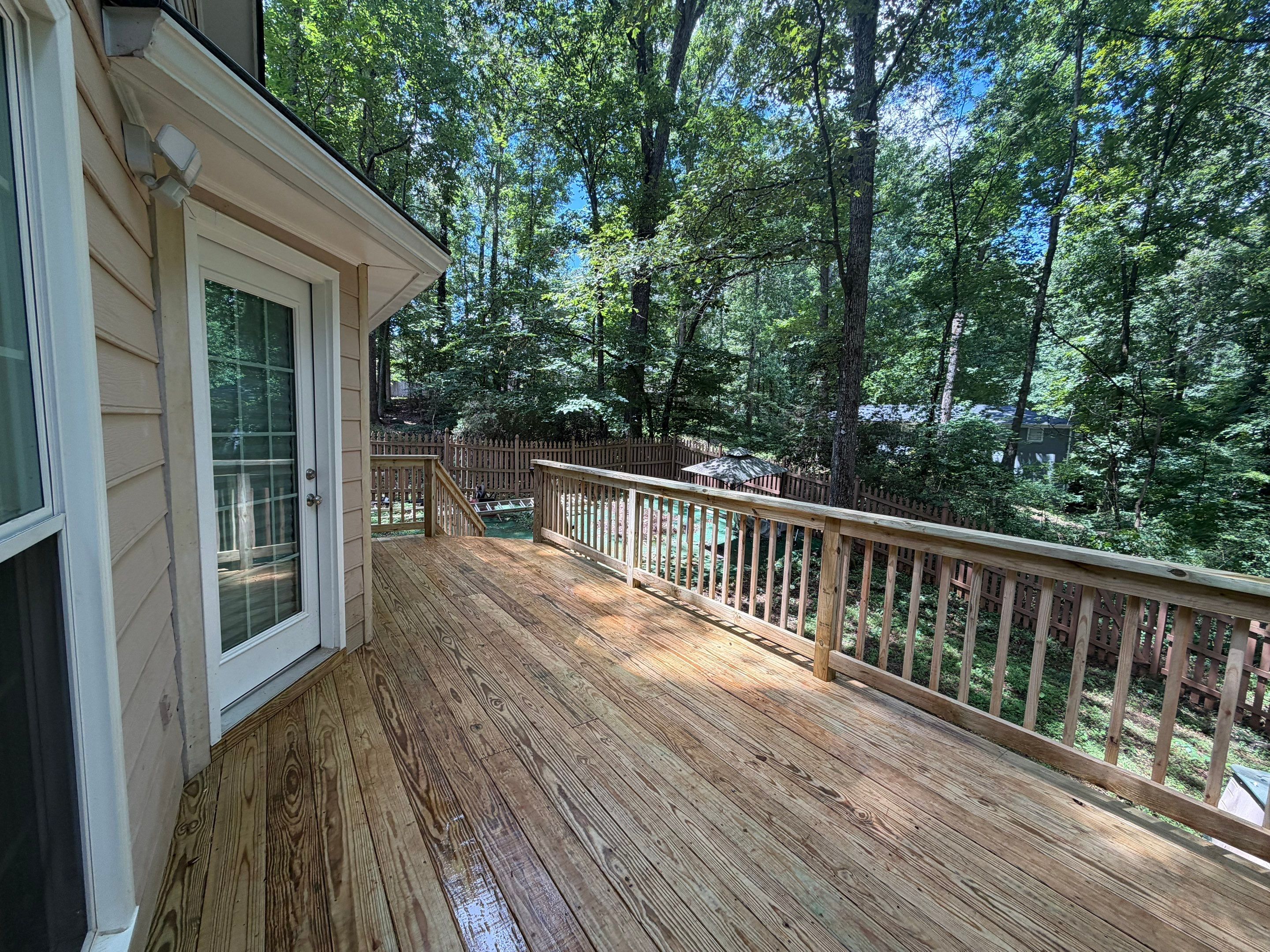 Marietta Deck Replacement with Pressure-Treated Wood and New Stairs by Swift Home Renovations