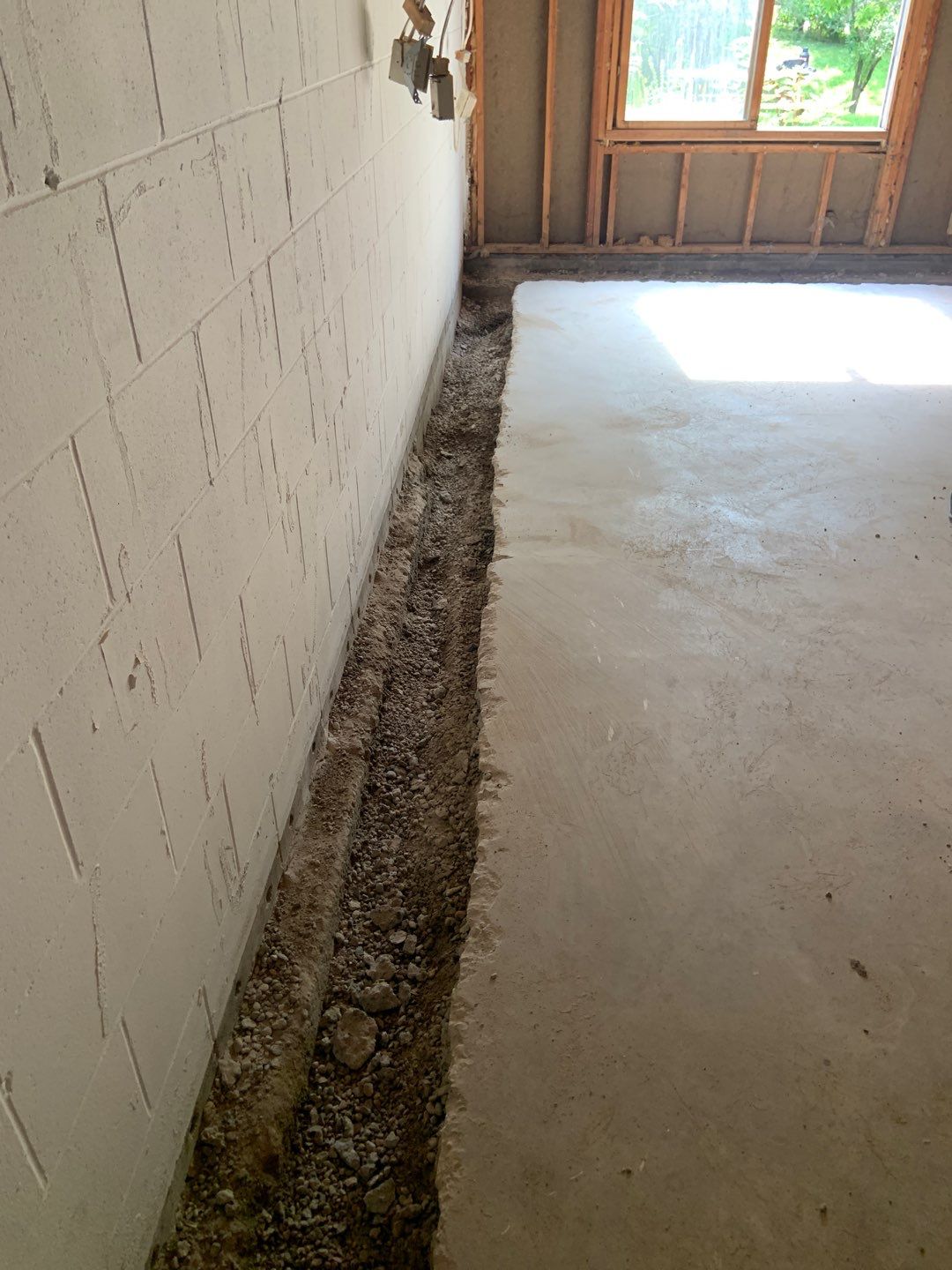 Correcting an Improper Installation for Alan in Chanhassen by Waterproofing Northeast