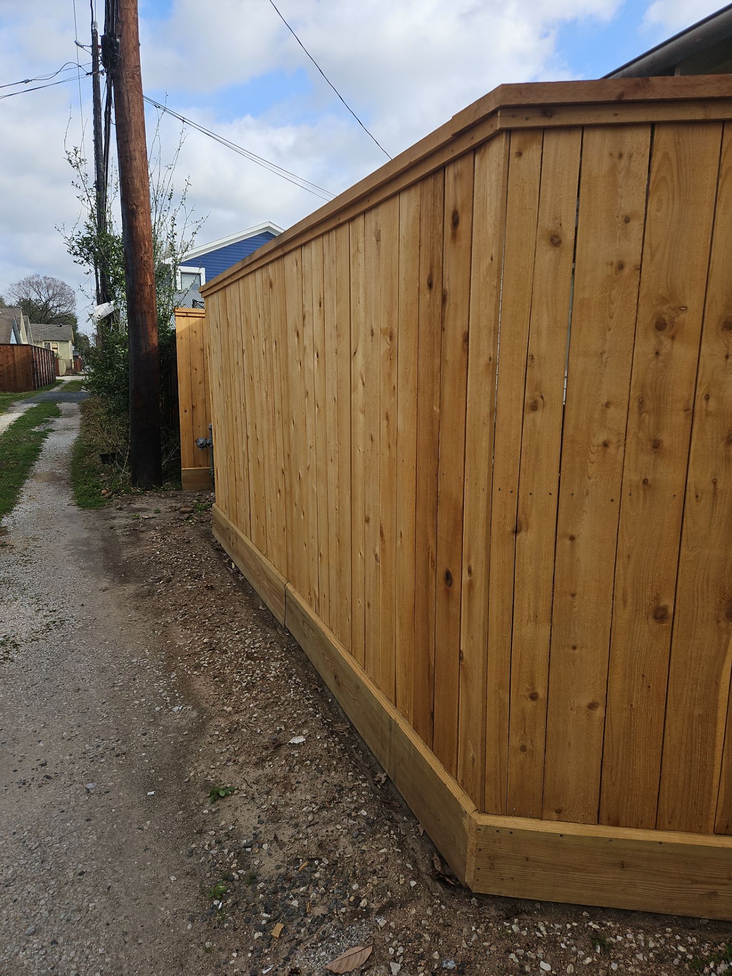 Durable Fence & Gate Installation with Premium Stain by Tim's Fences