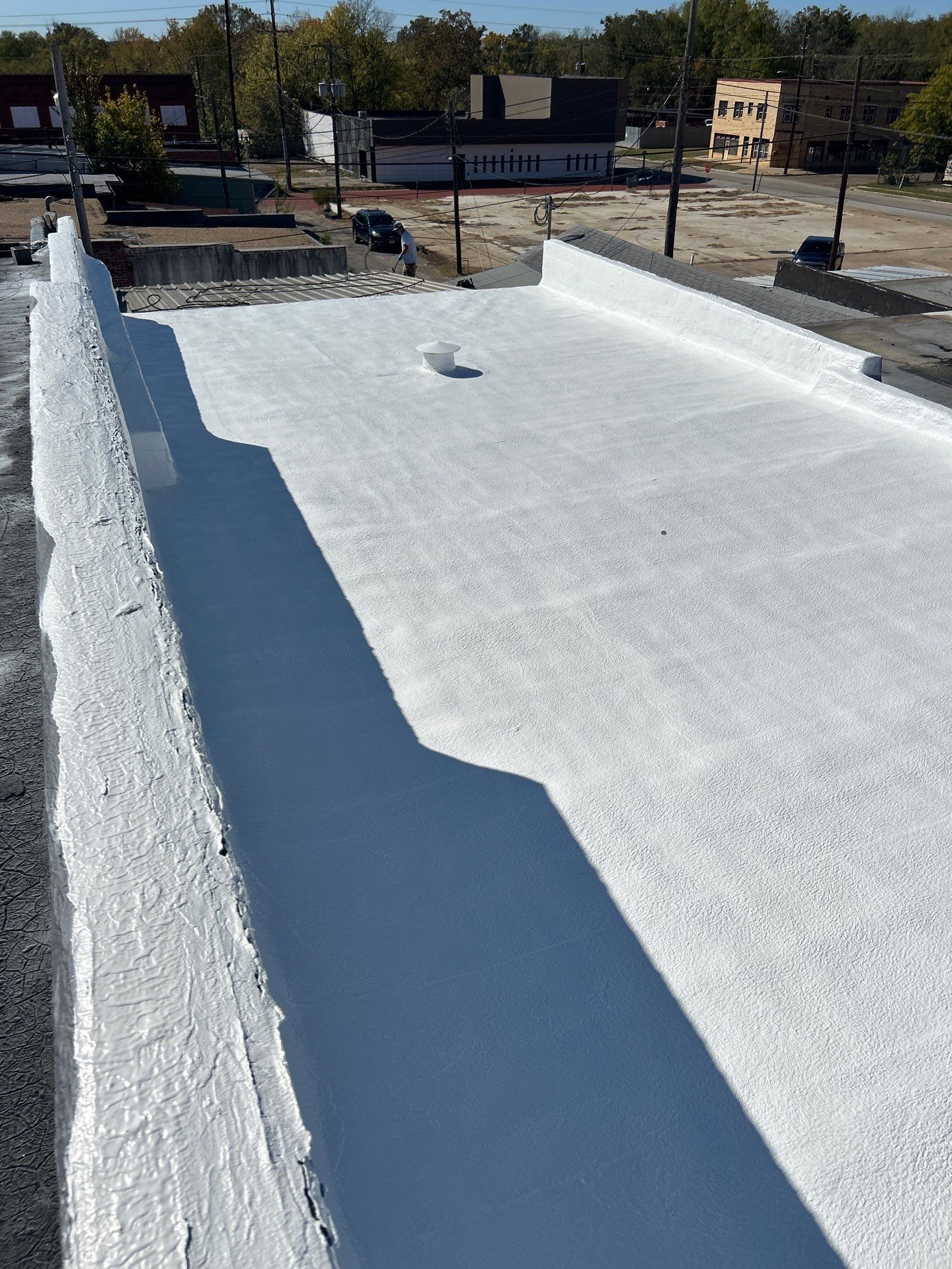 Downtown Gladewater Commercial Foam Roof Restoration – SPF + High-Tensile Acrylic by All Star Roofing LLC