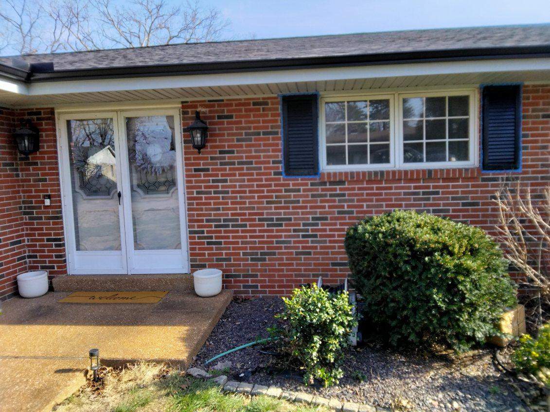 Exterior Metal Shutter Repainting - Fenton, MO by Legendary Services Company LLC.