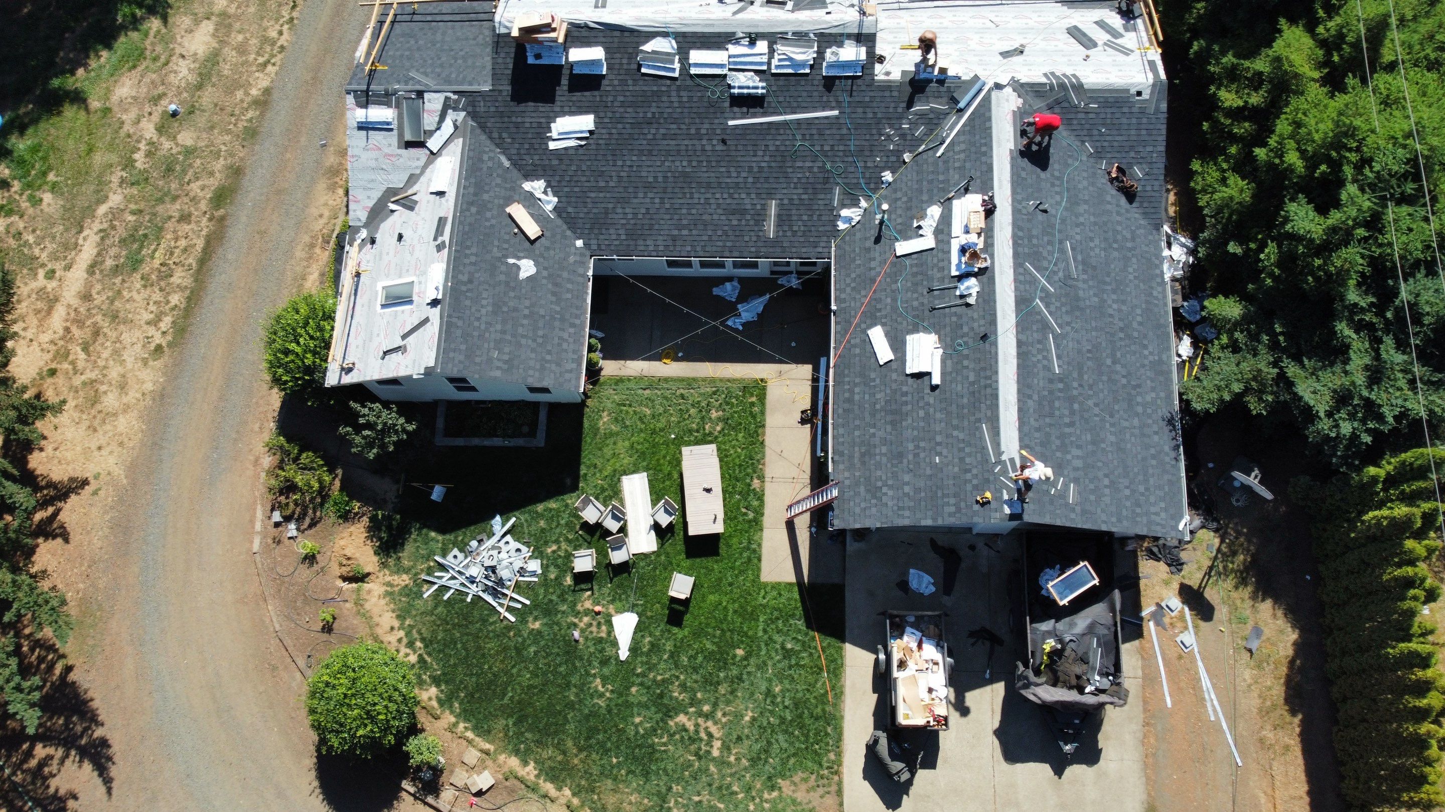 Residential Roofing Installation using IKO Dynasty (Color: Granite Black) by Orezona Building & Roofing Company, Inc.
