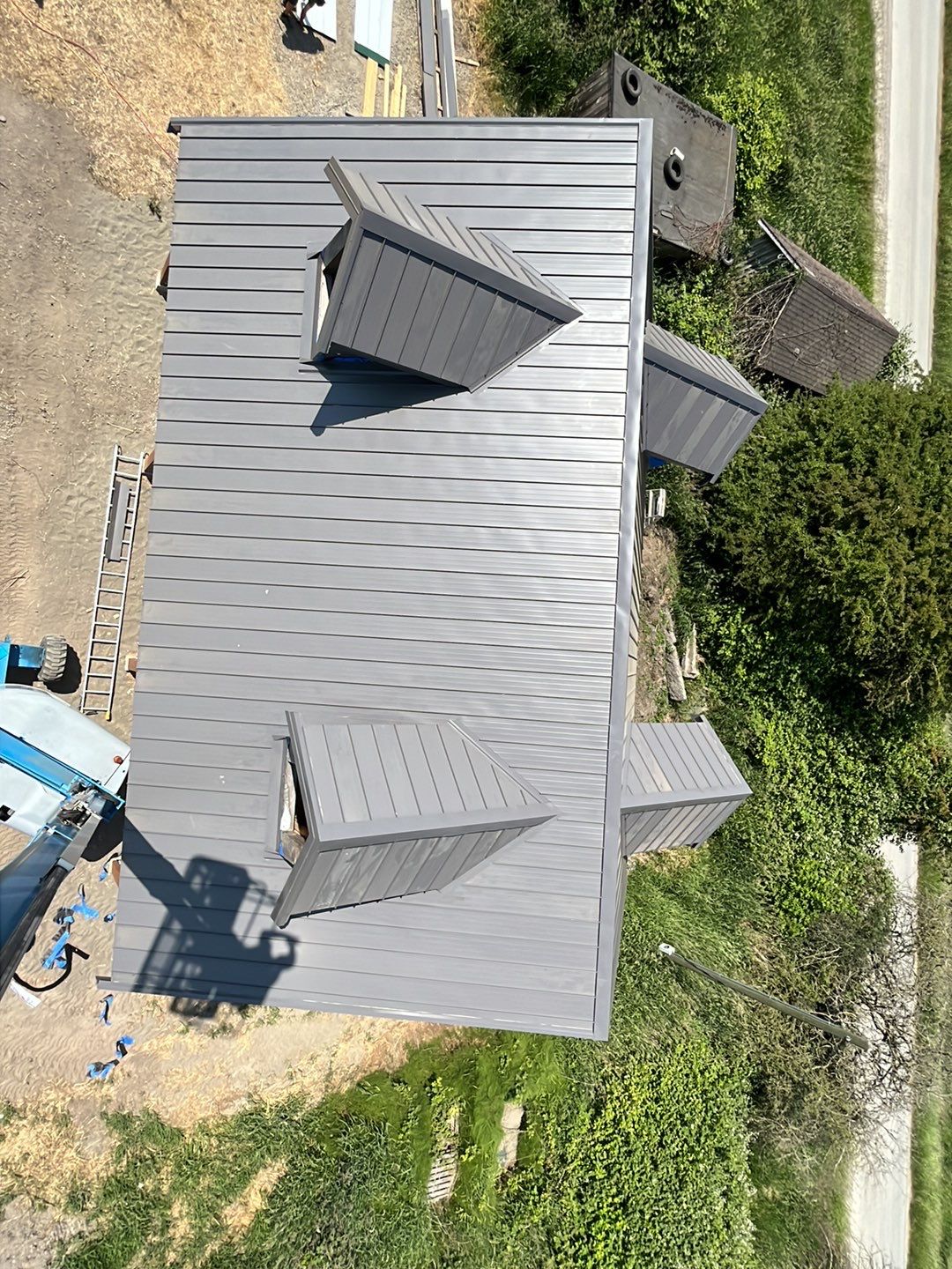 Agricultural Roofing Installation using 12" Prolok metal  by Top Notch Roofing Inc