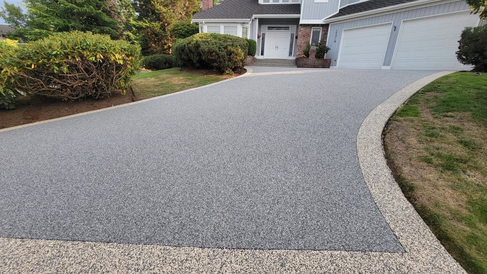 Elegant Driveway and Patio in Palazzo Vuba Stone by Concrete Coating Experts Inc.