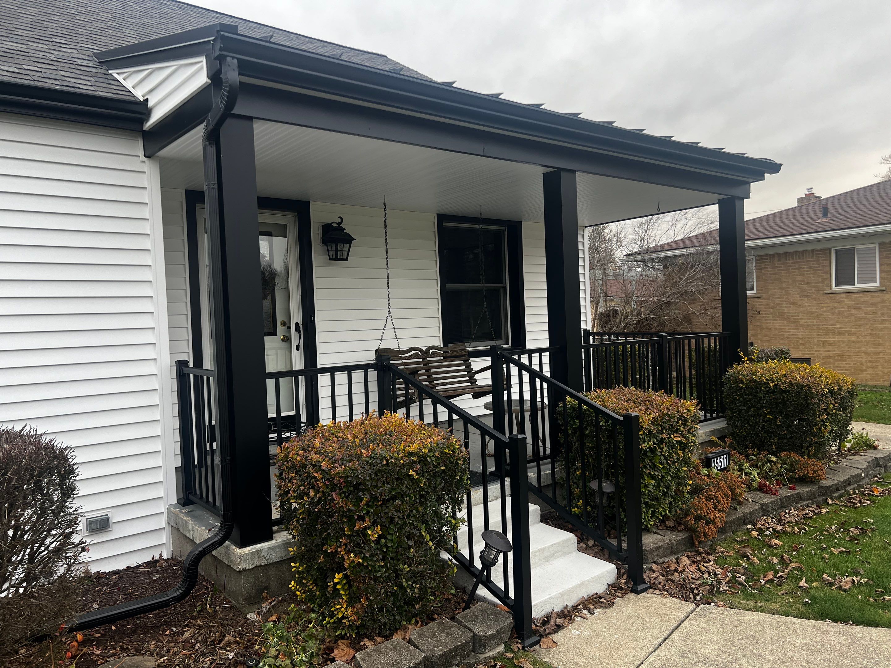 Siding Replacement using CertainTeed Monogram vinyl in Colonial White & Front Porch Remodel by Bloomfield Construction & Restoration